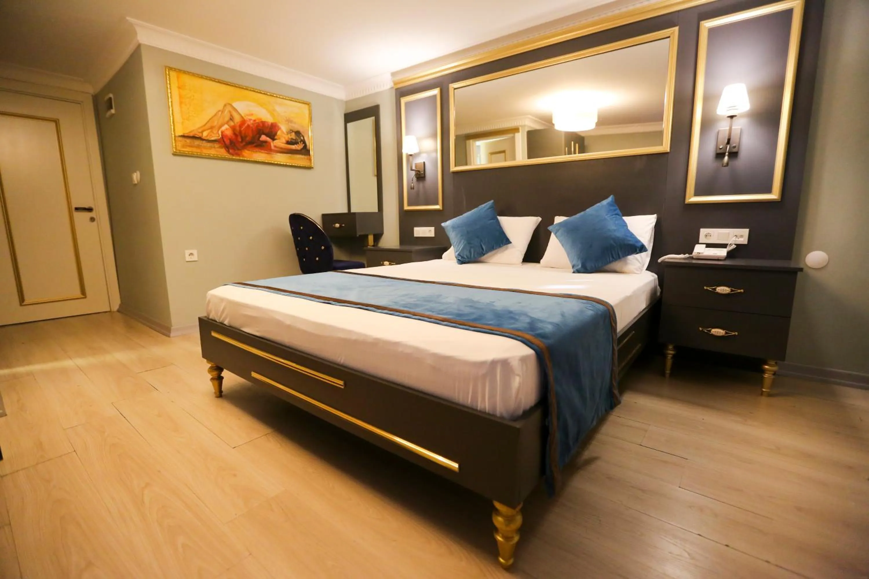 Bed in Grand Moon Hotel Suites