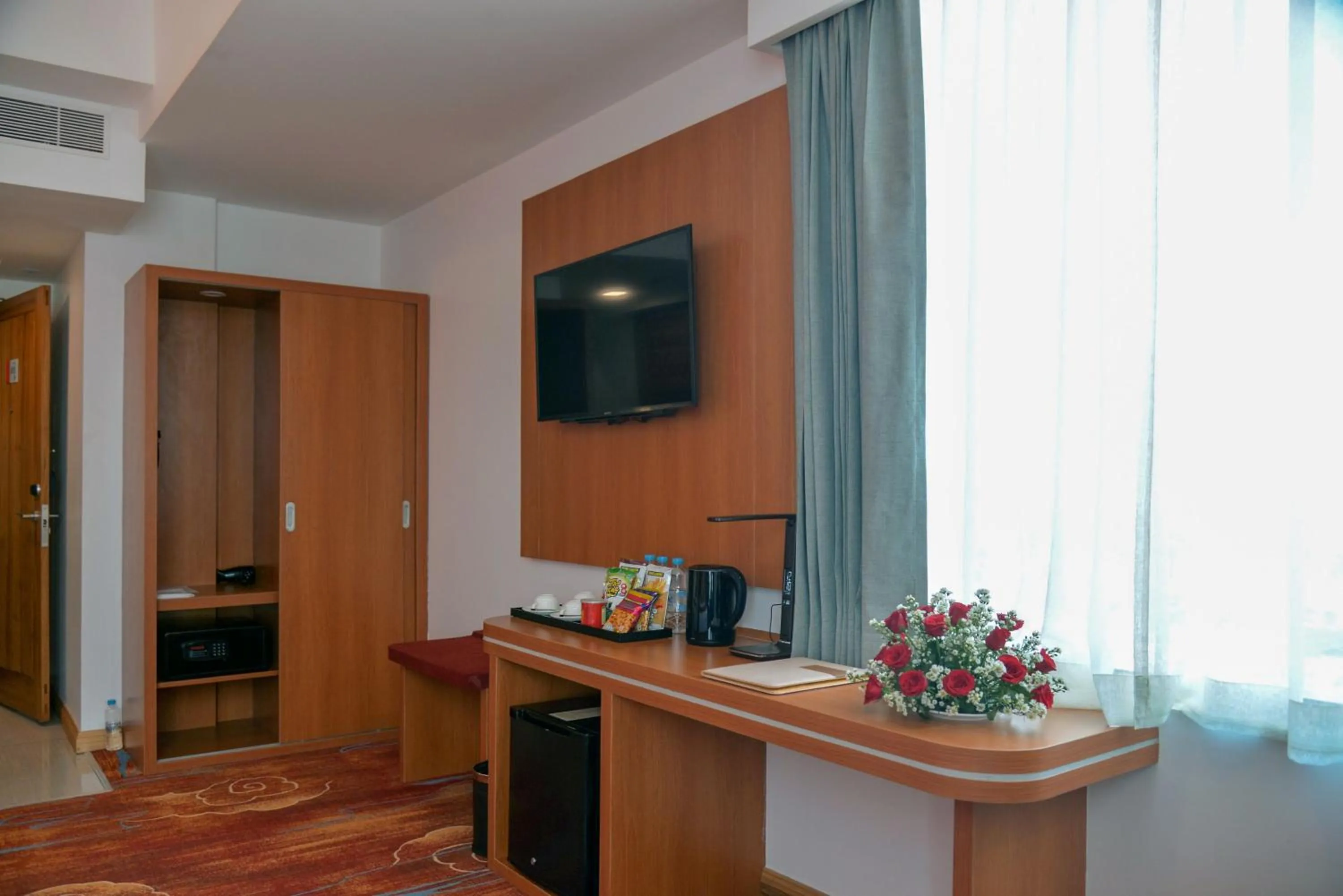 Communal lounge/ TV room in Ritz Grand Hotel Mandalay