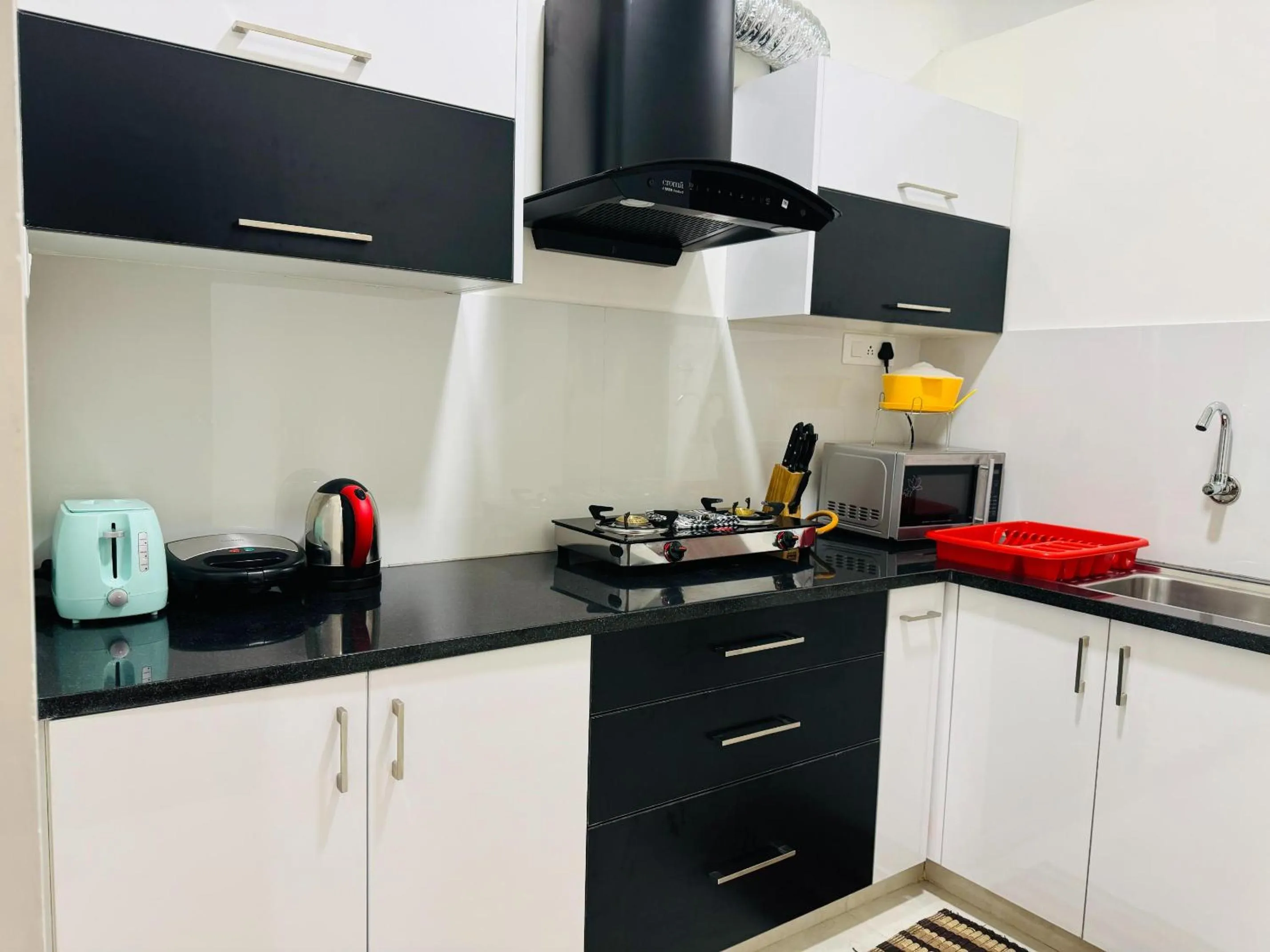 Kitchen or kitchenette in Olive Serviced Apartments HSR Layout