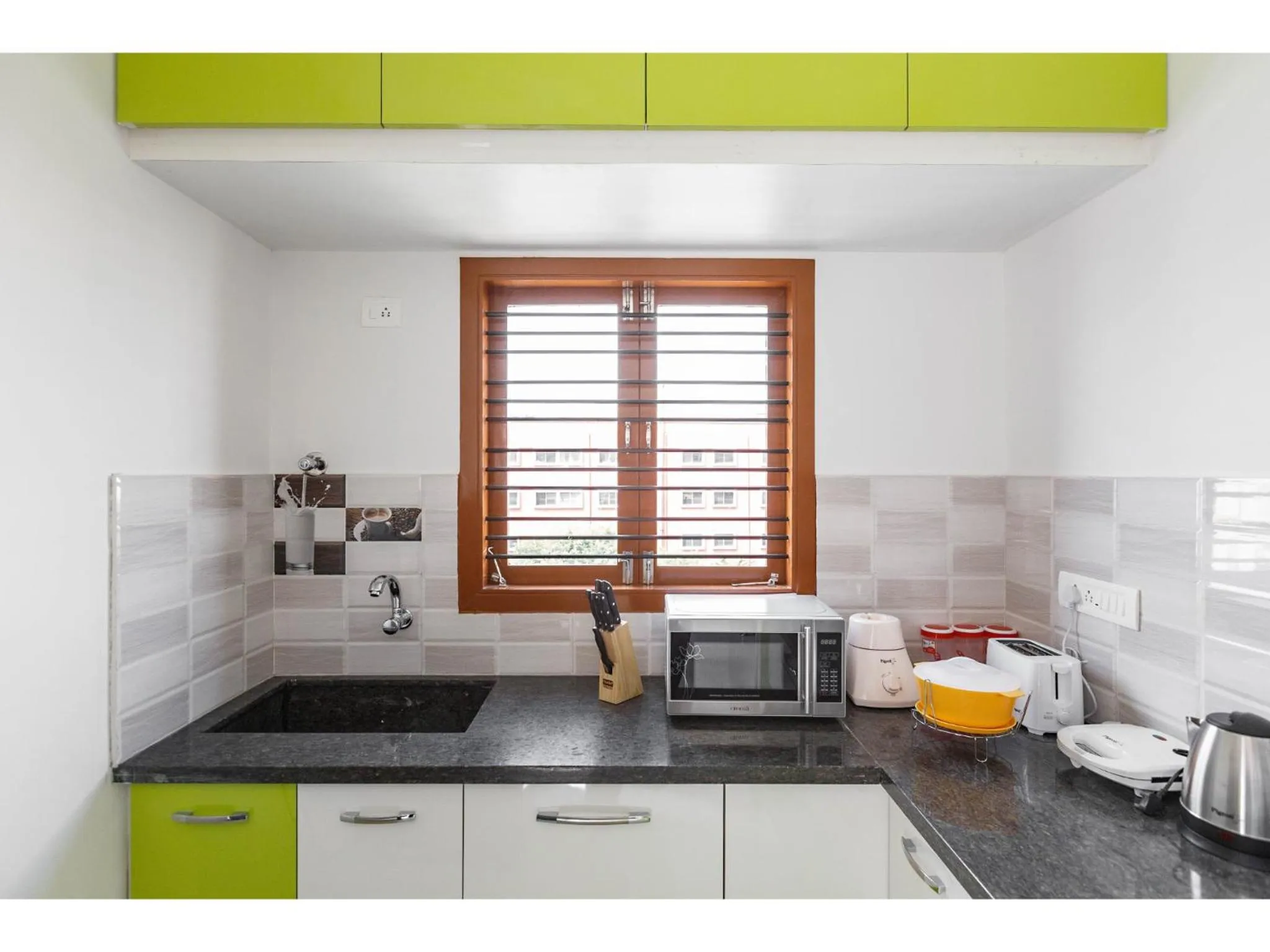 Kitchen or kitchenette in Olive Serviced Apartments HSR Layout