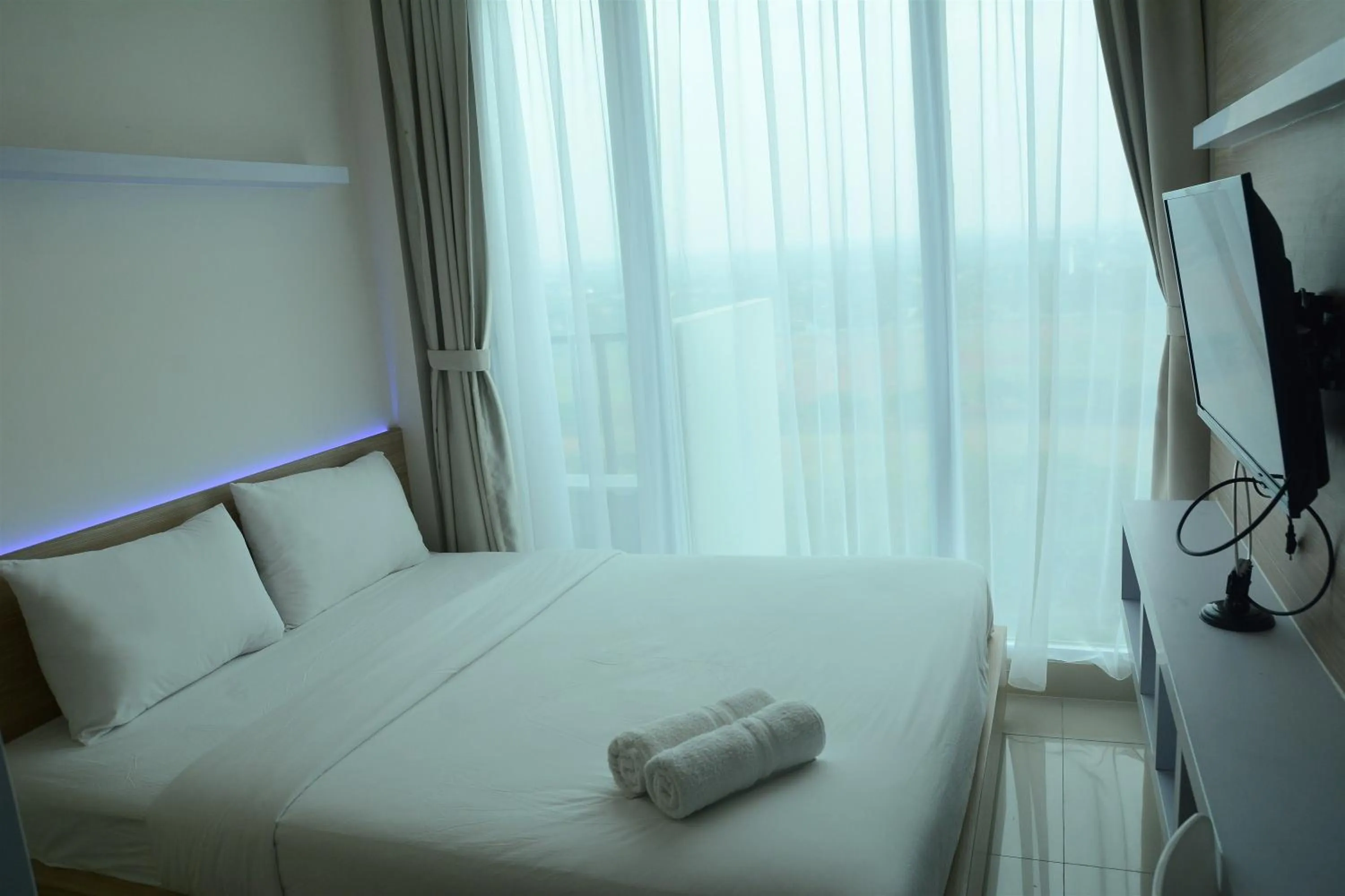 Bedroom, Bed in Brand New Studio Tree Park City BSD Apartment near ICE BSD By Travelio