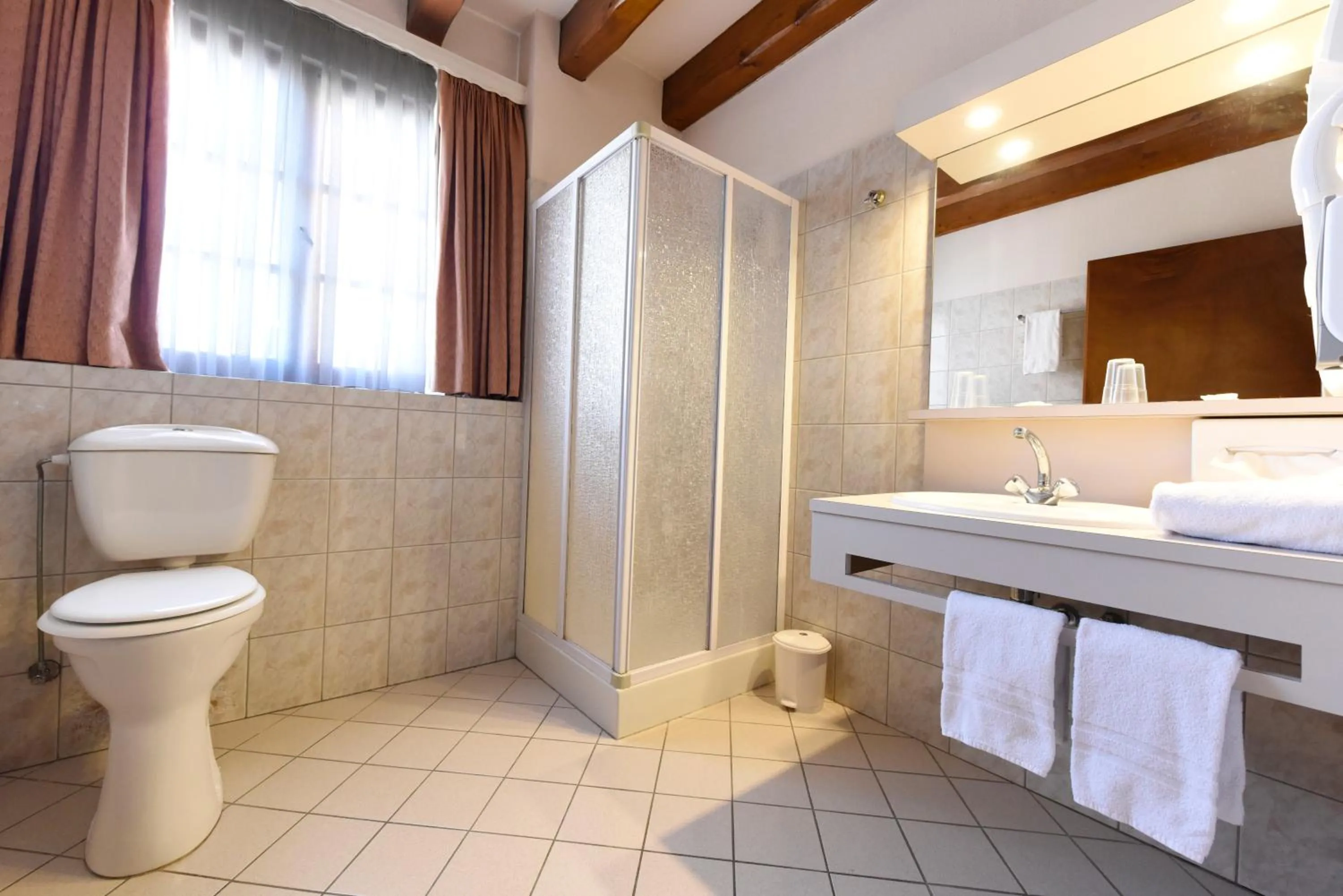 Bathroom in Hotel et Spa du Scharrach