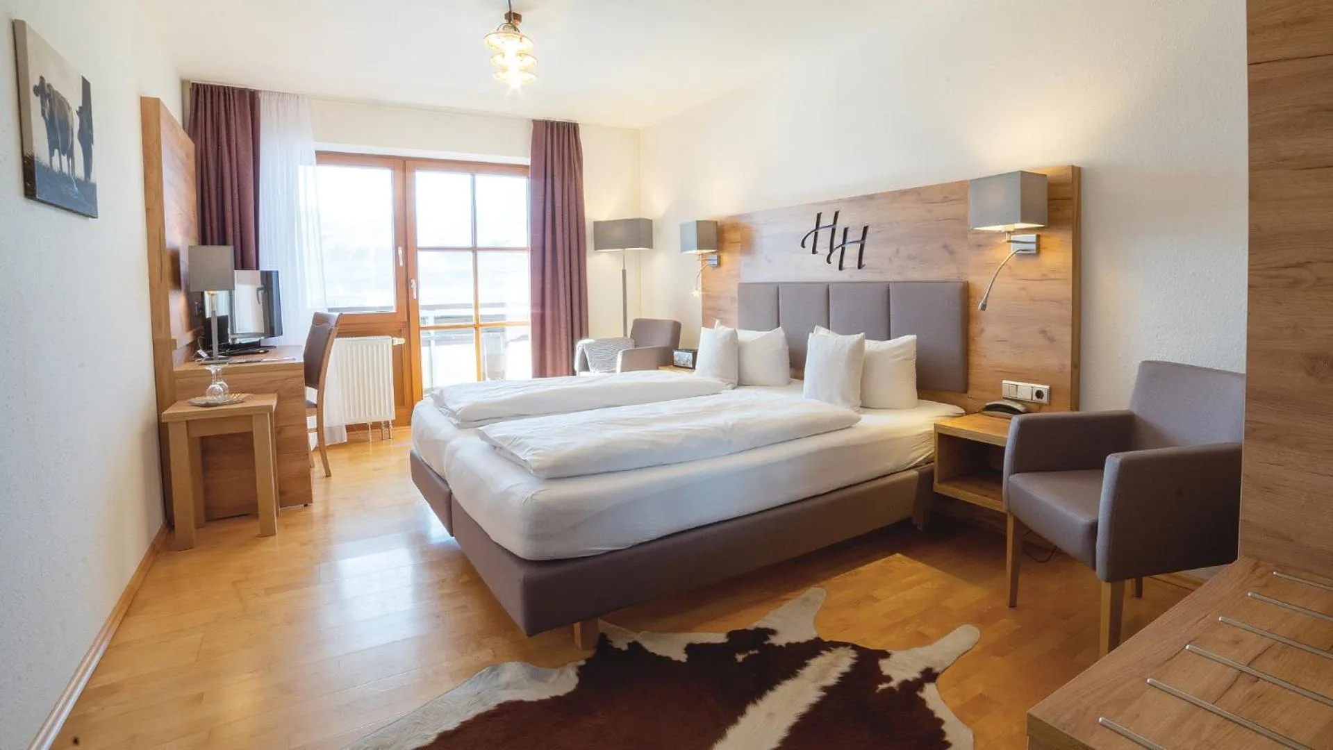 Photo of the whole room, Bed in Hartungs Hoteldorf