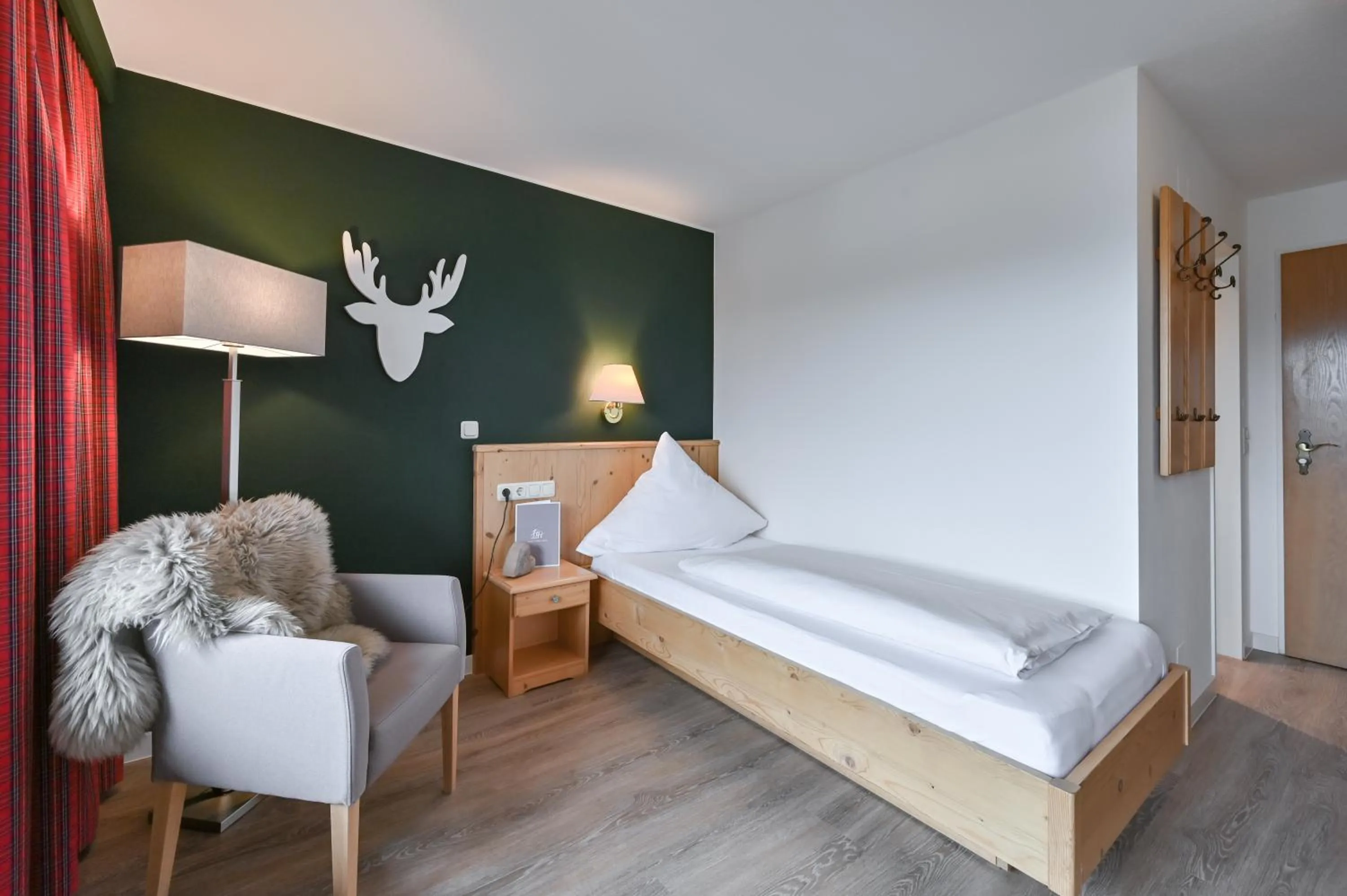 Photo of the whole room, Bed in Hartungs Hoteldorf