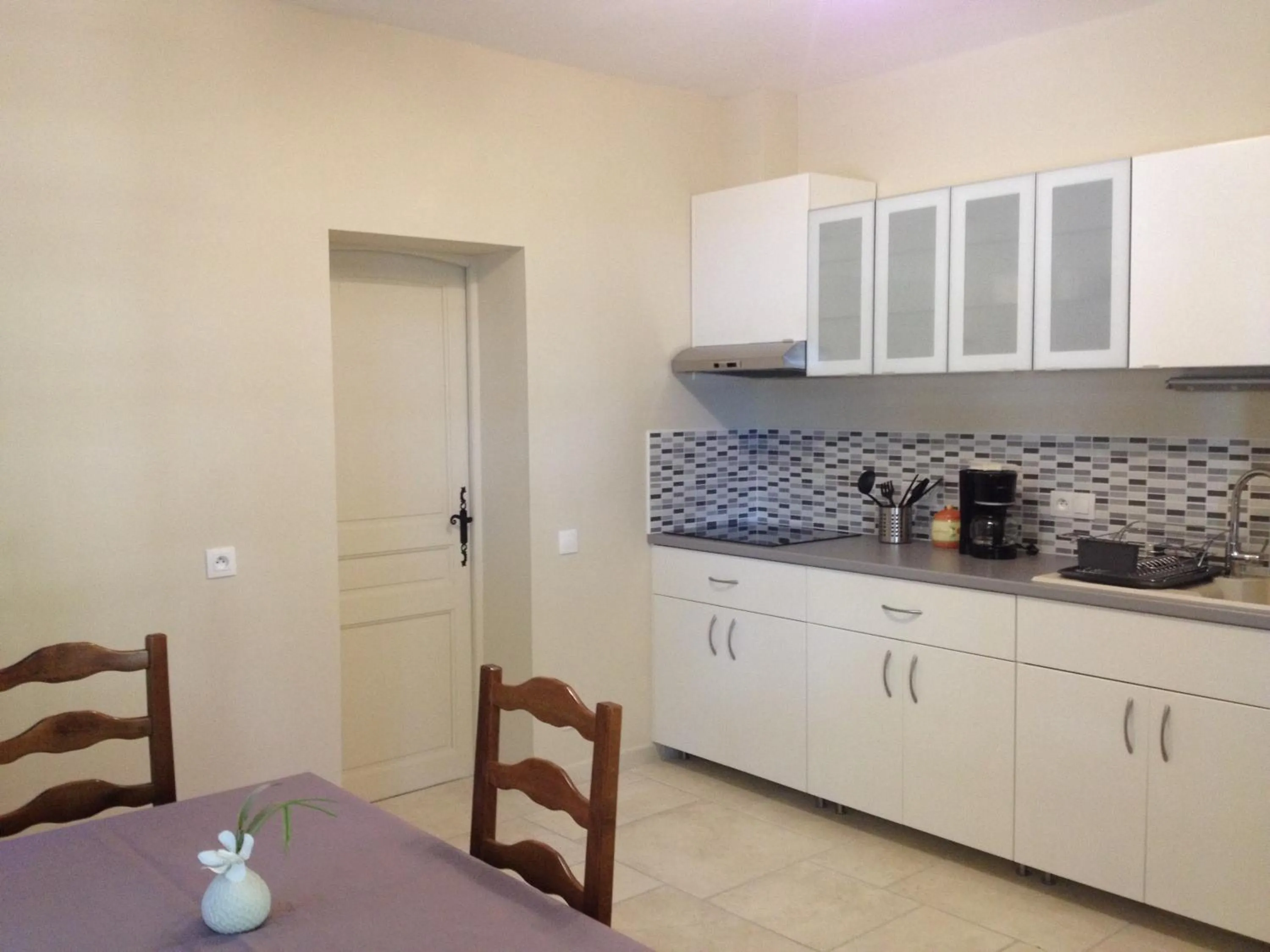 Kitchen or kitchenette in Logis du Comte