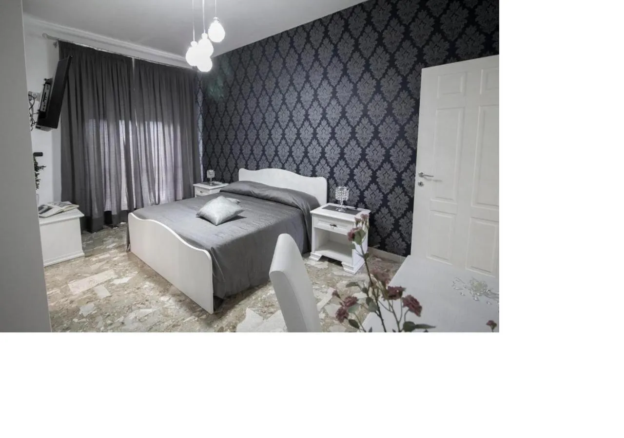Photo of the whole room, Bed in B&B ARENA