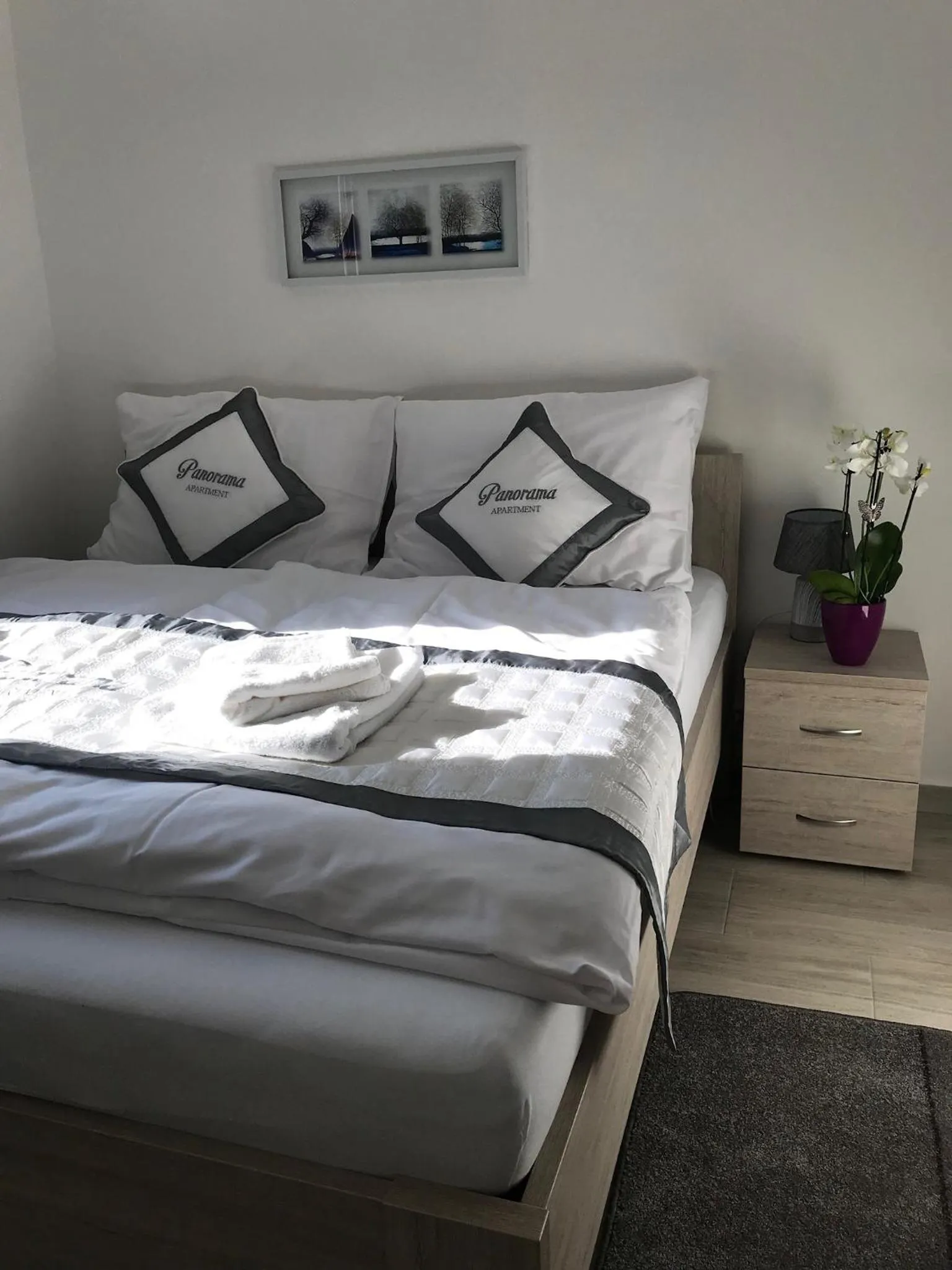 Bed in Panorama Apartments