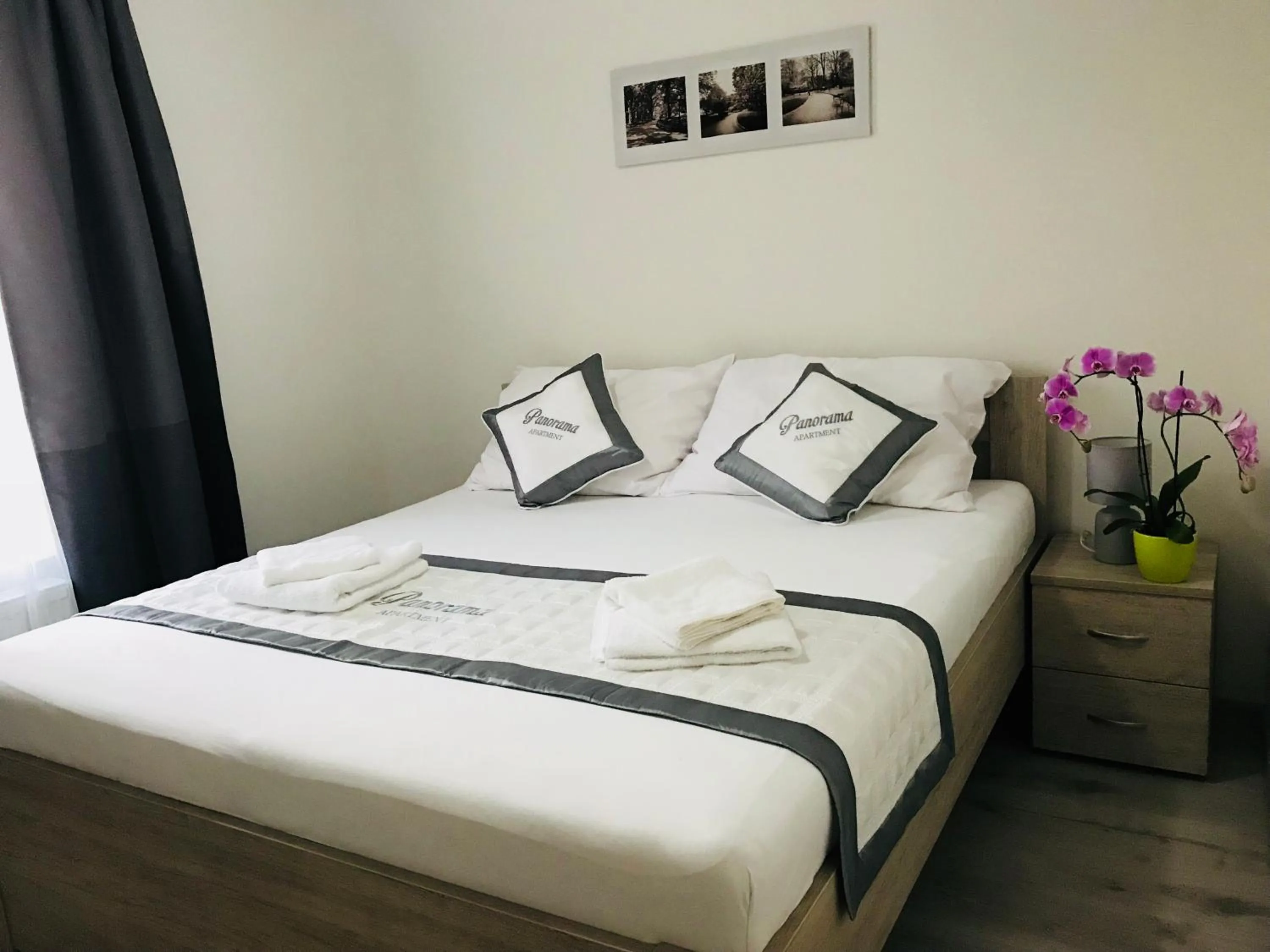 Bed in Panorama Apartments