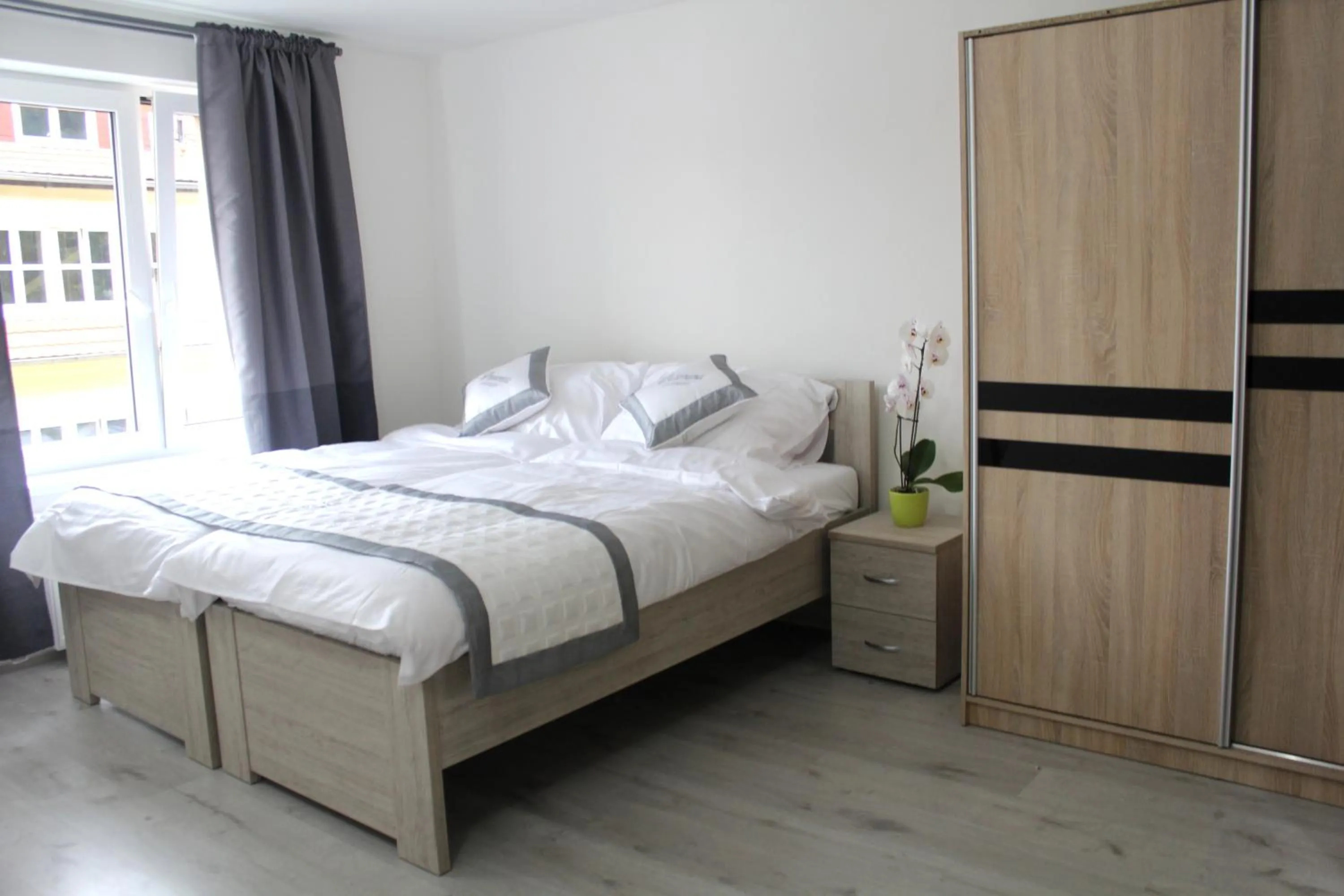 Bed in Panorama Apartments