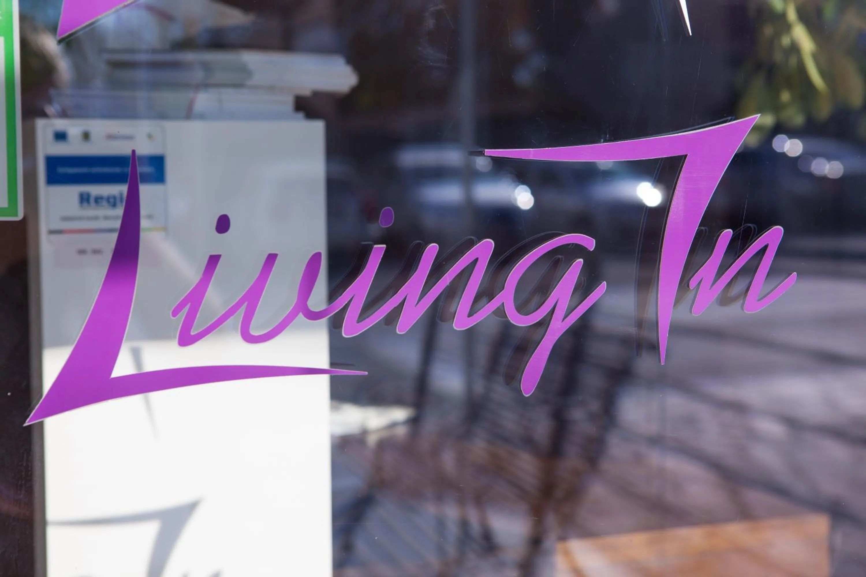 Property logo or sign in Living In Aparthotel