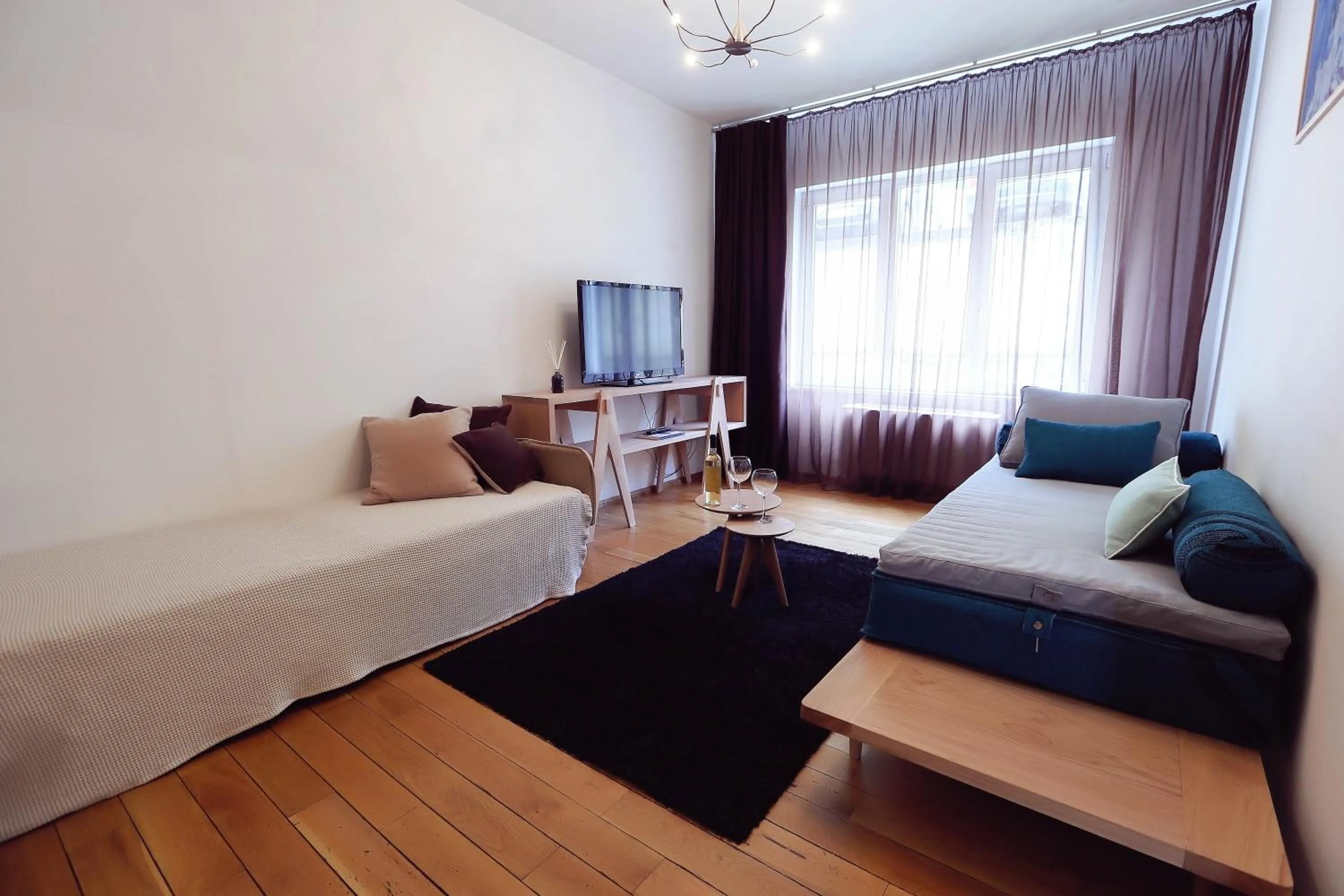 Photo of the whole room, Bed in Living In Aparthotel