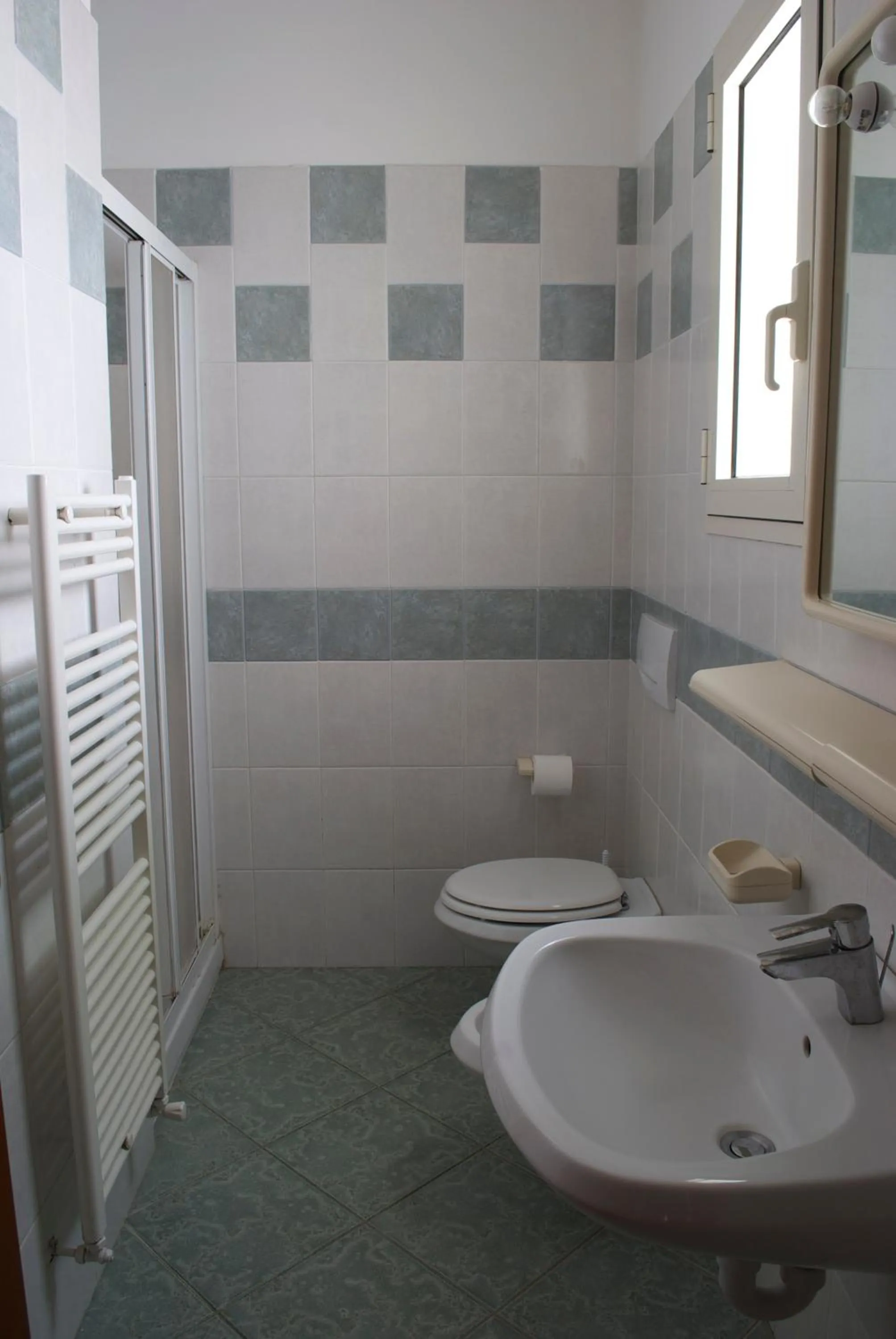 Bathroom in Residence Hotel Baia del Sole
