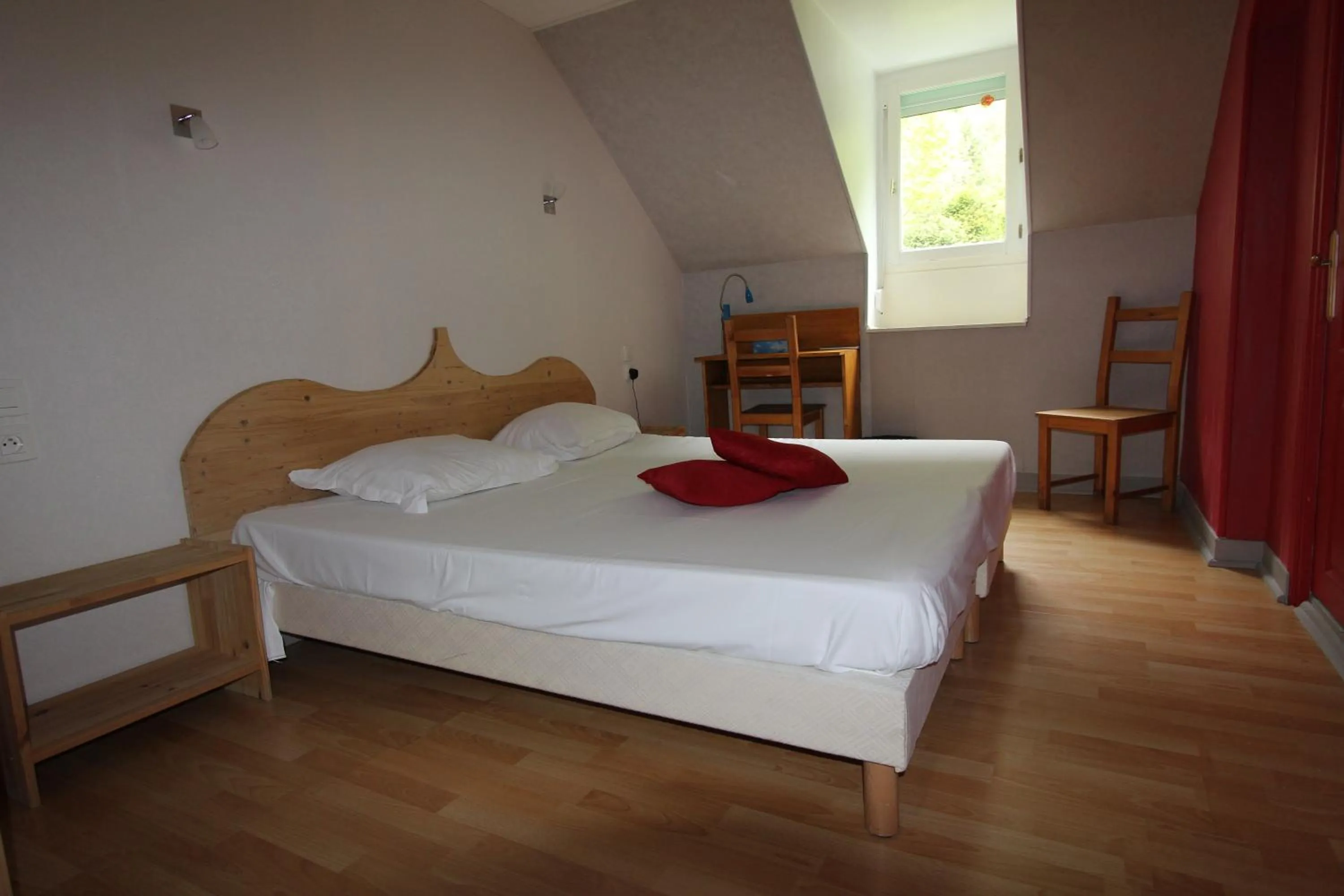 Bed in Auberge La Caverne