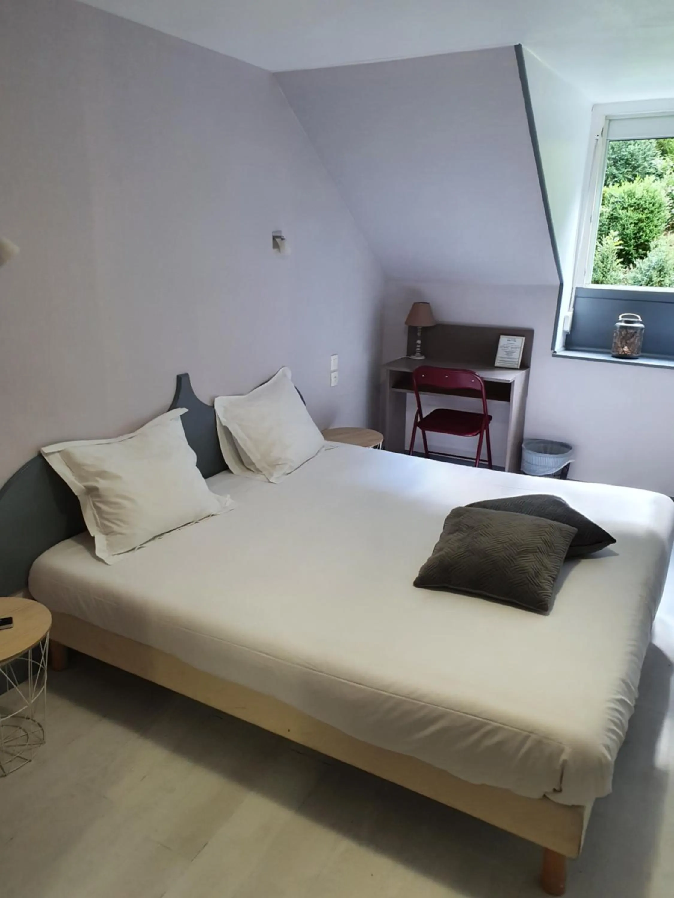 Bed in Auberge La Caverne