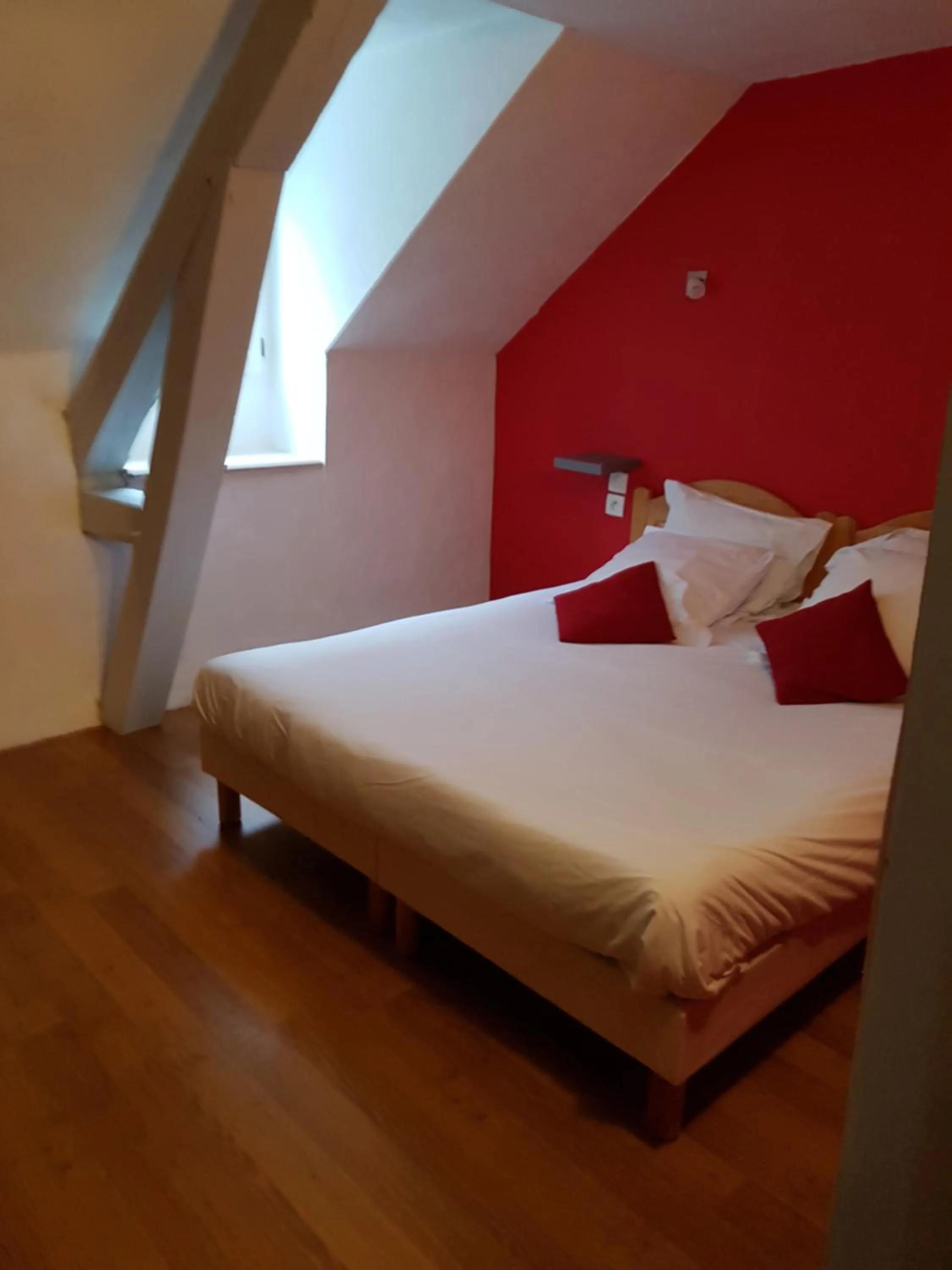 Bed in Auberge La Caverne