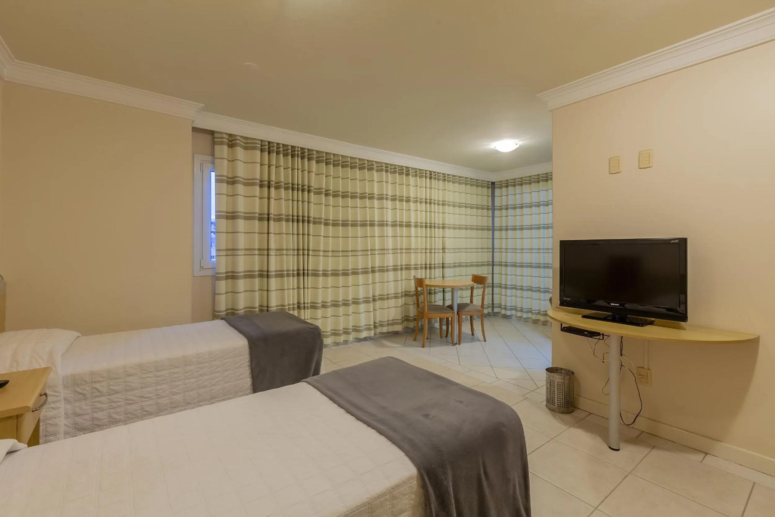 Bedroom, Bed in Tri Hotel Executive Criciúma