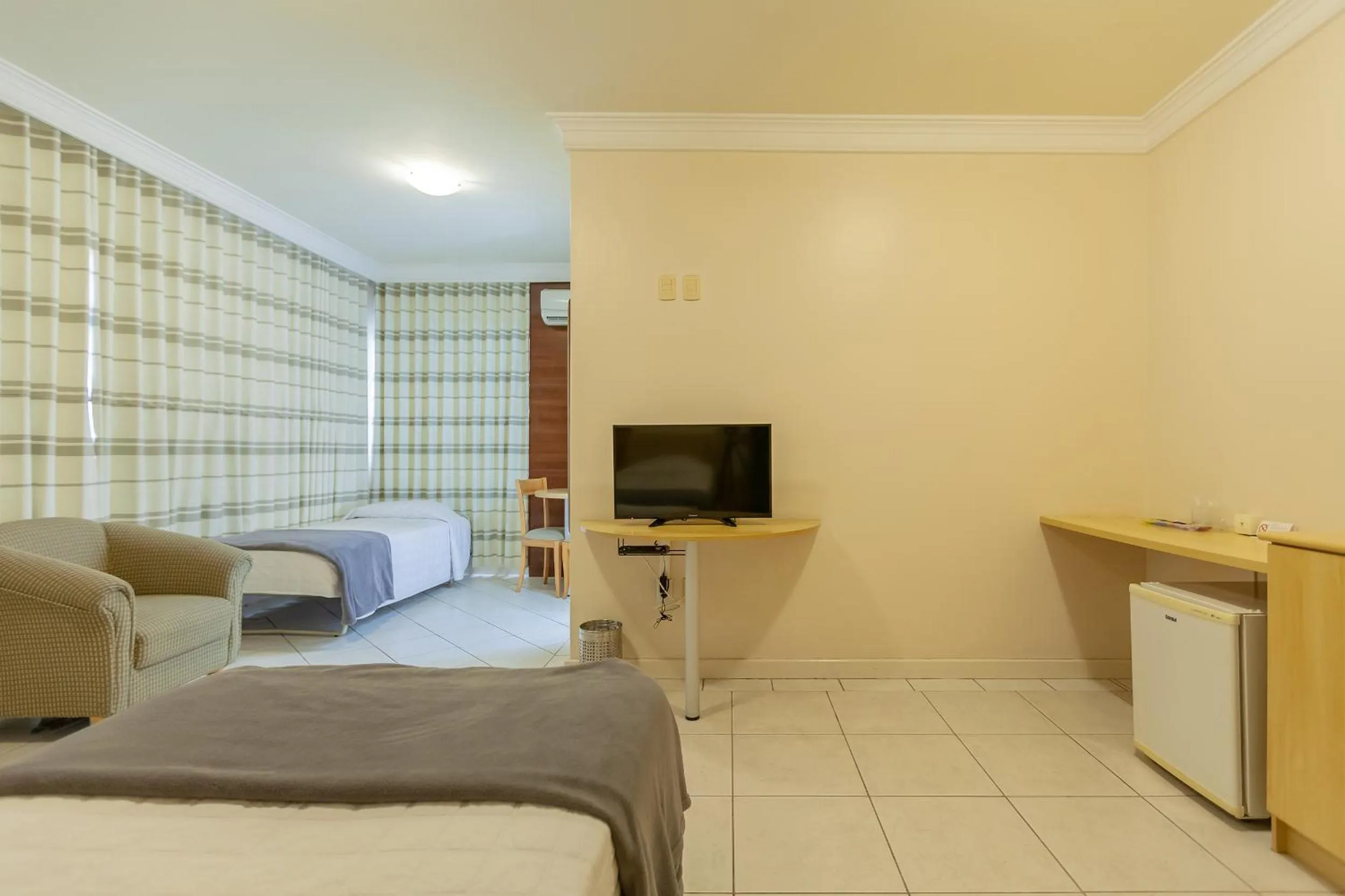 TV and multimedia, Bed in Tri Hotel Executive Criciúma