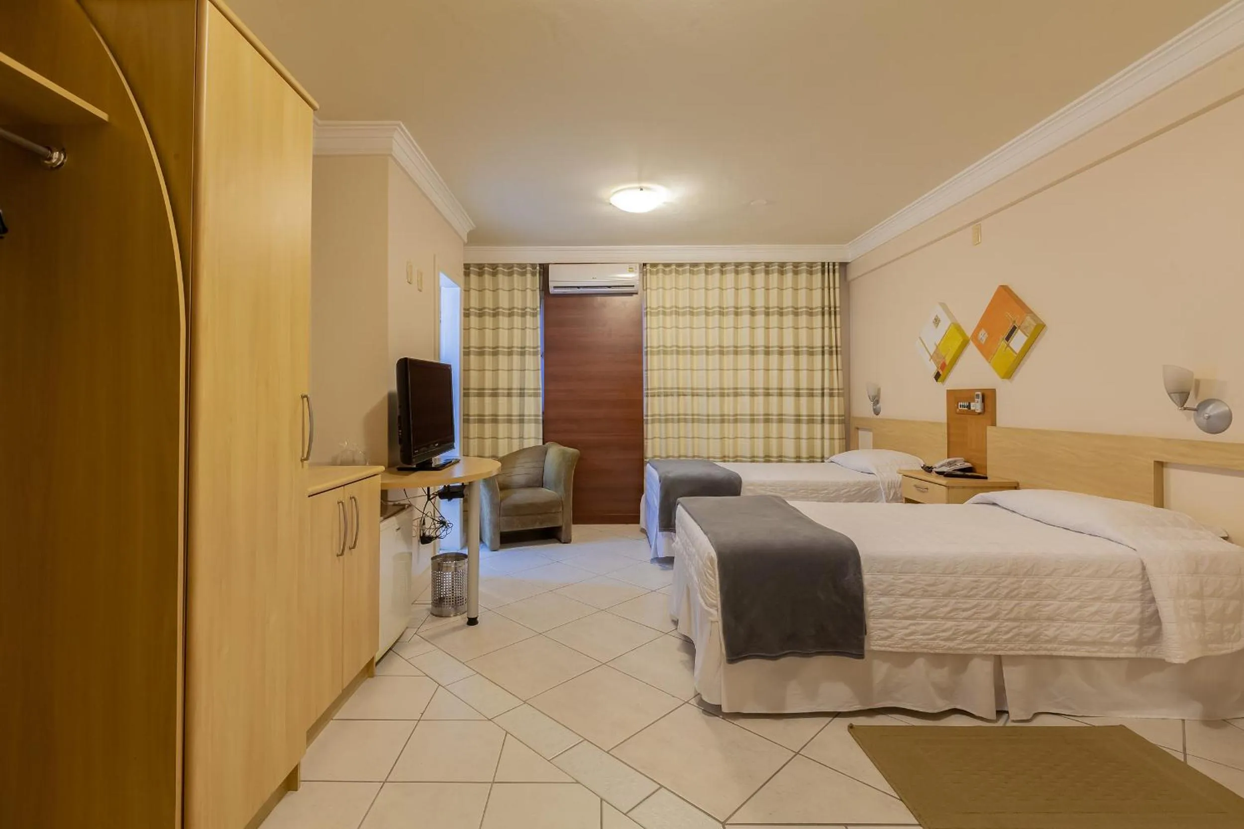 Bedroom, Bed in Tri Hotel Executive Criciúma