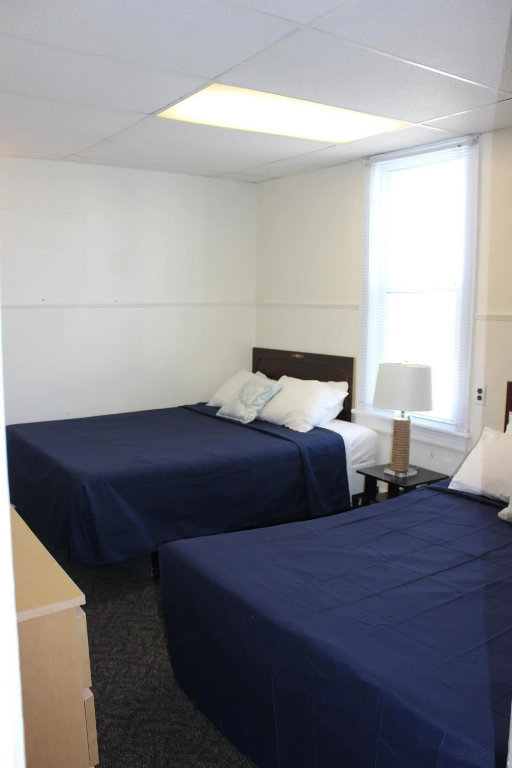 Standard Room with Two Double Beds in Blue Water Inn Standard Room with Two Double Beds in Blue Water Inn