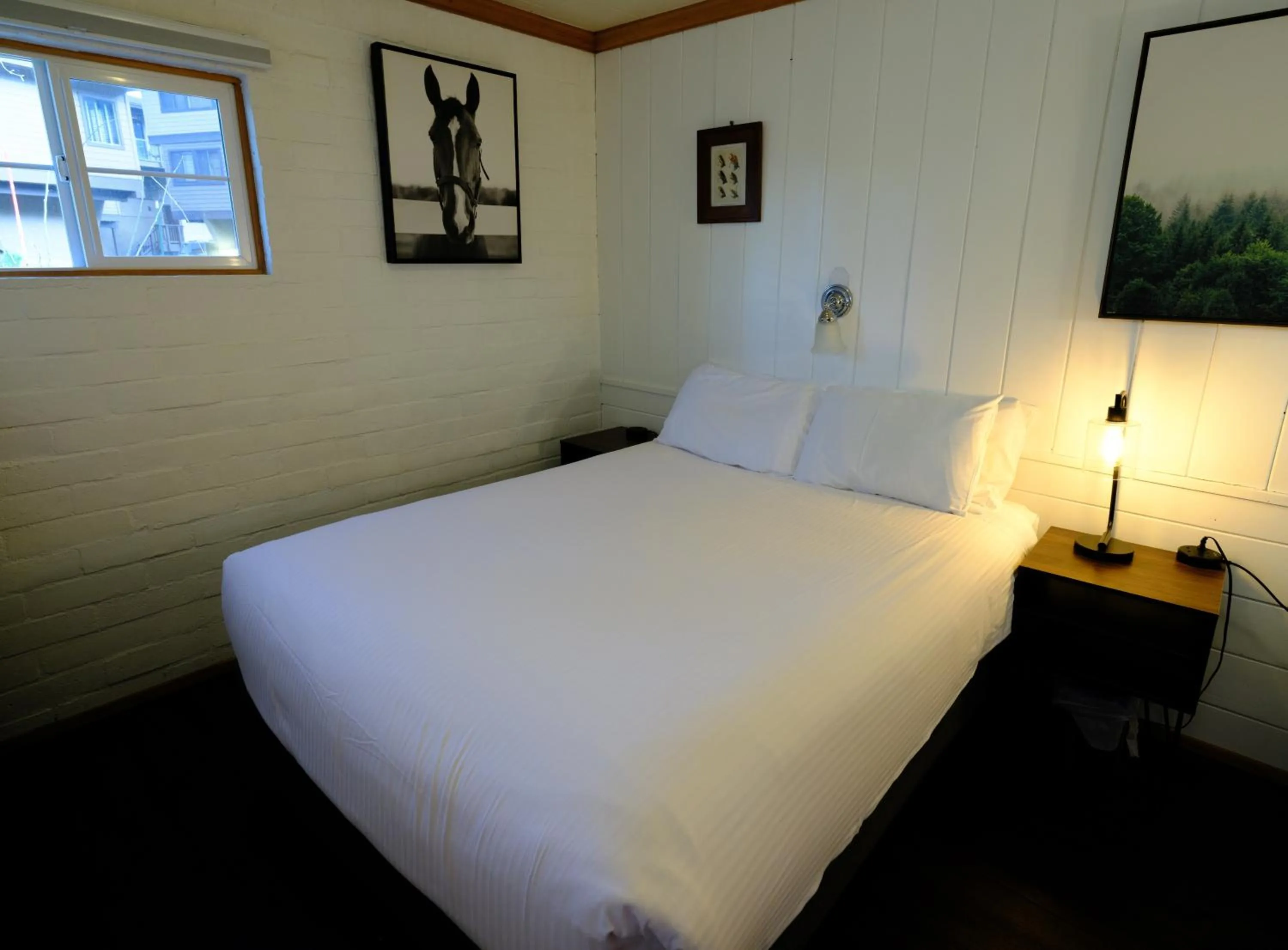Bed in Lake Front Cabins