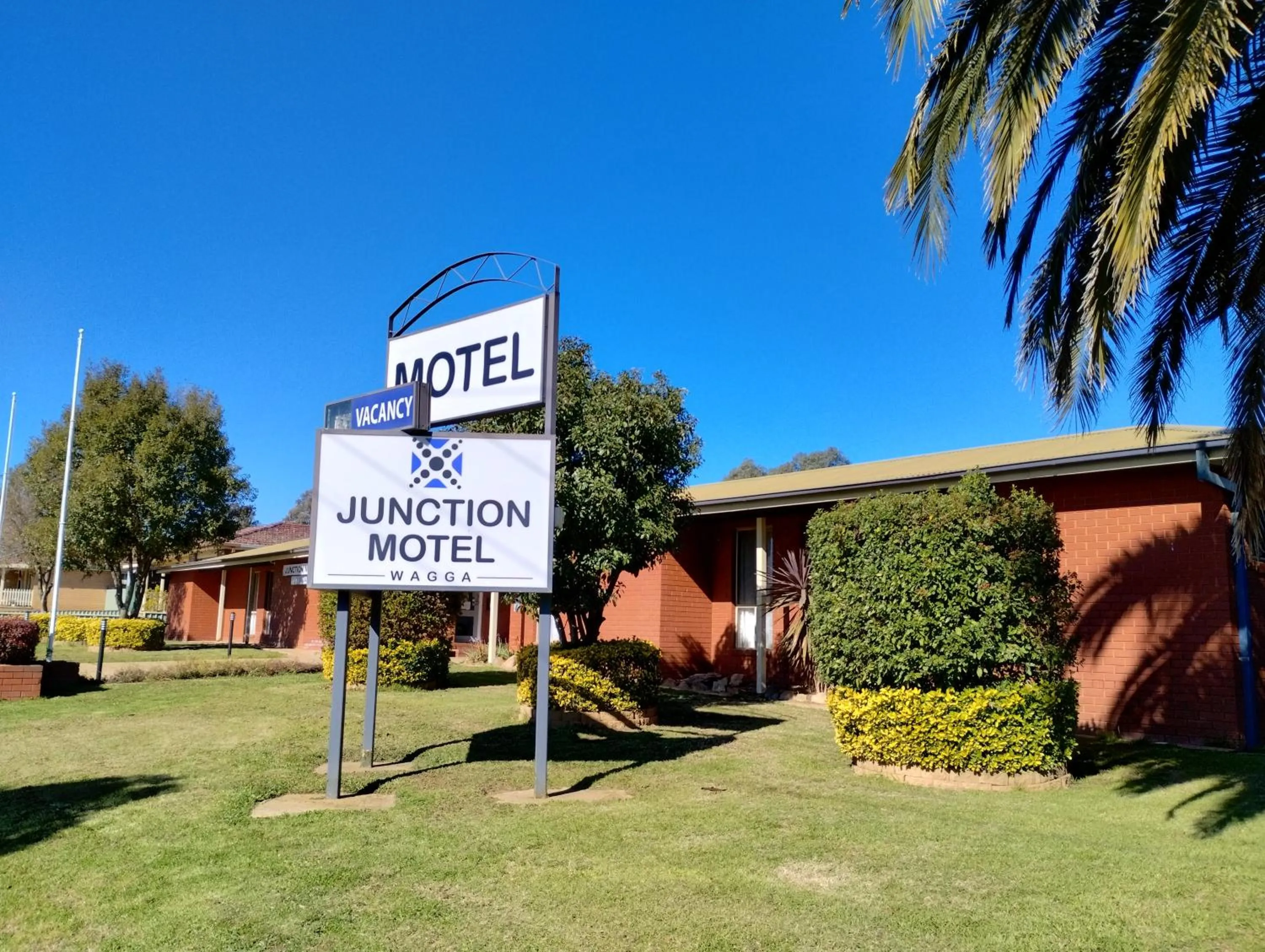 Property logo or sign in Junction Motel Wagga