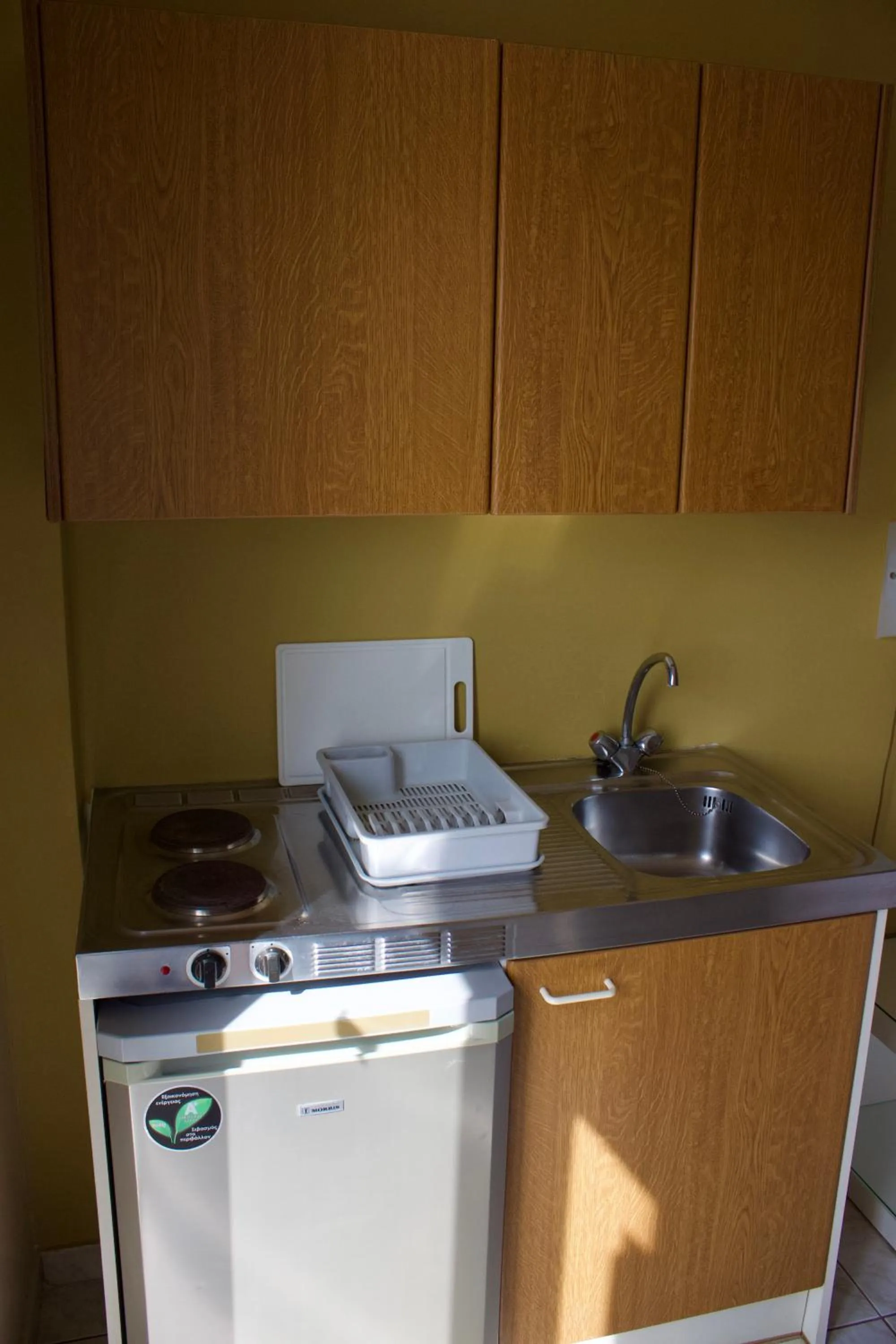 Kitchen or kitchenette in Notos Luxury Studios