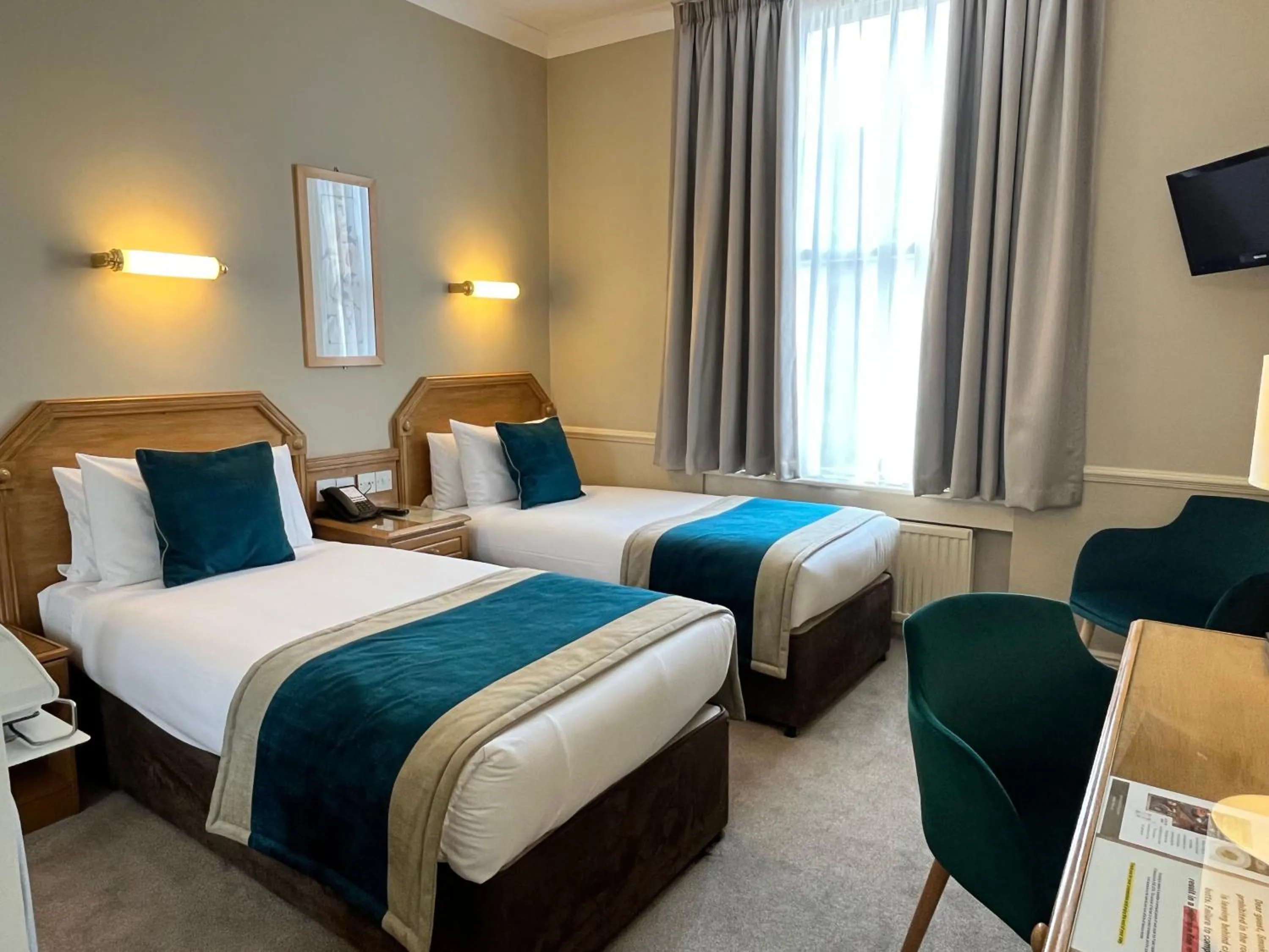 Bed in Harcourt Hotel