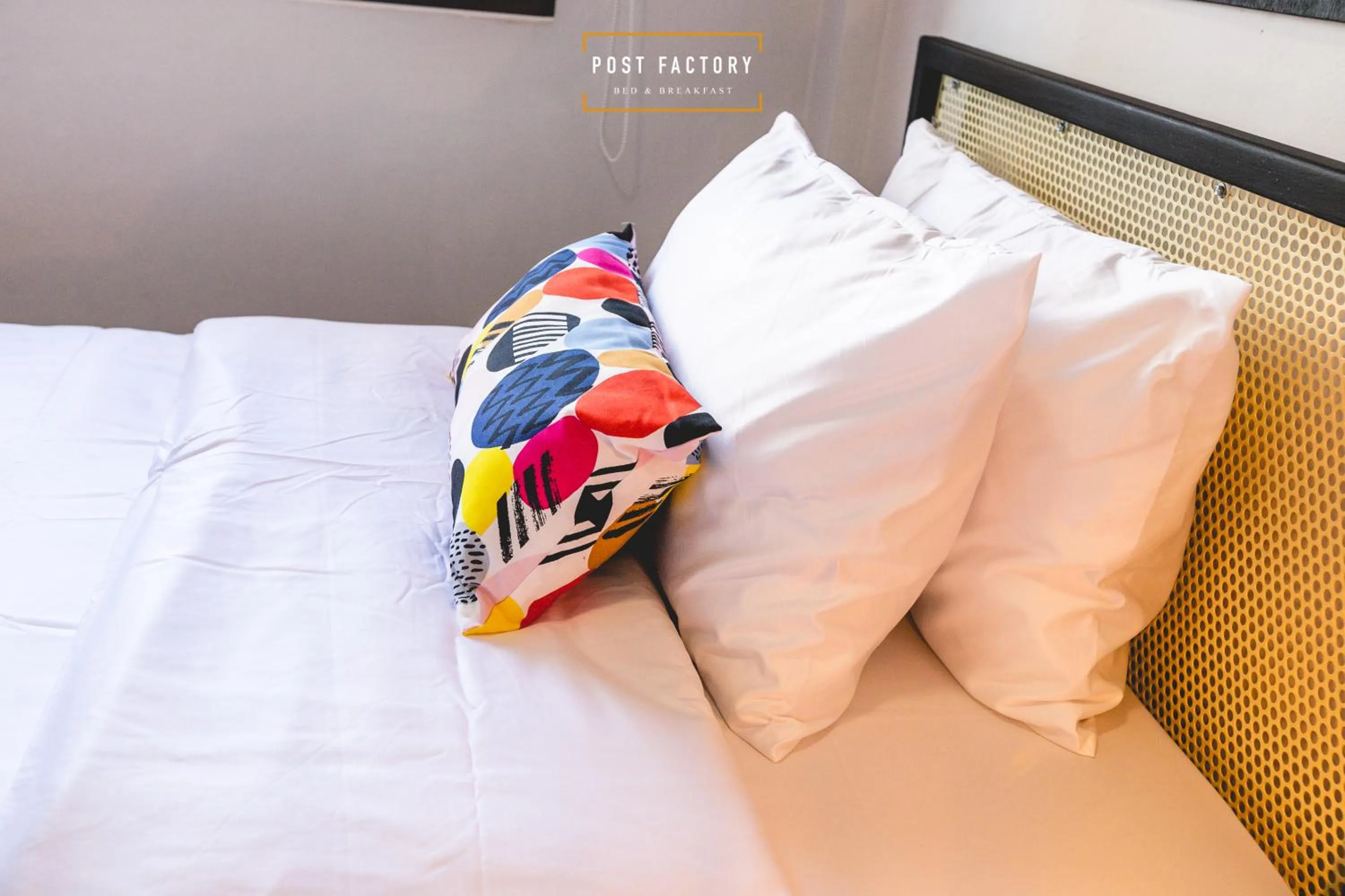 Bed in Post Factory Bed & Breakfast