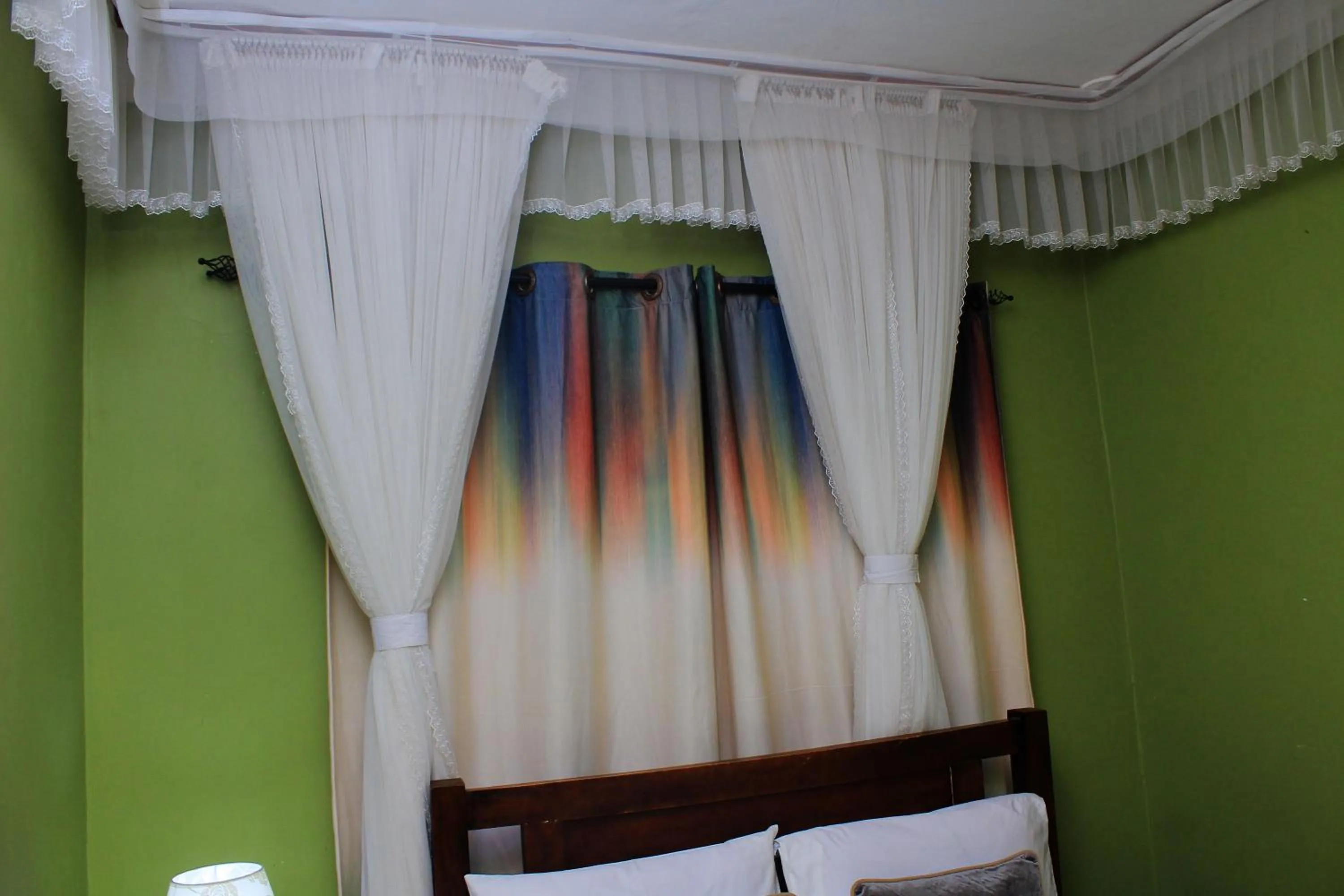 Bed in MAMIKKI Hotel Apartments