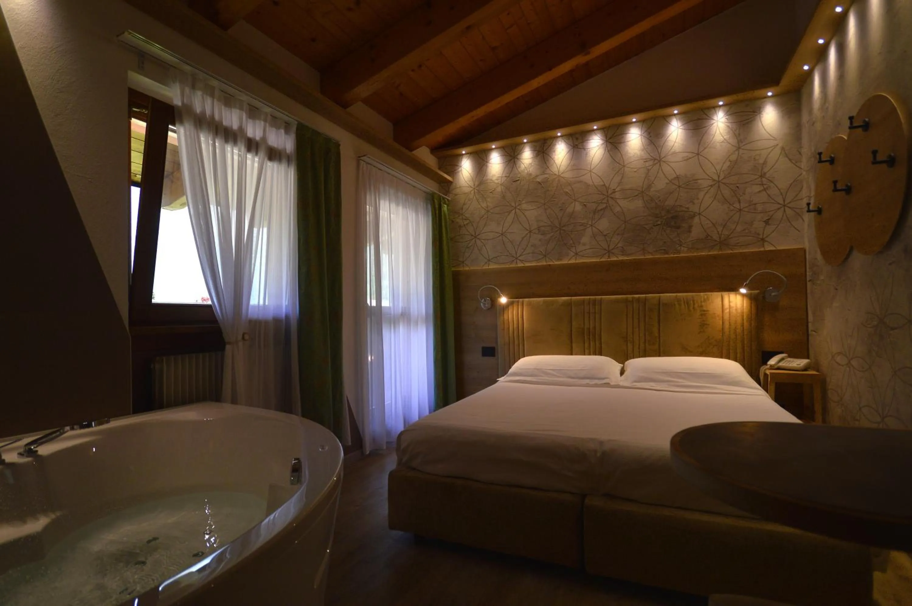 Bed in Hotel Villa Fosine Spa & Wellness