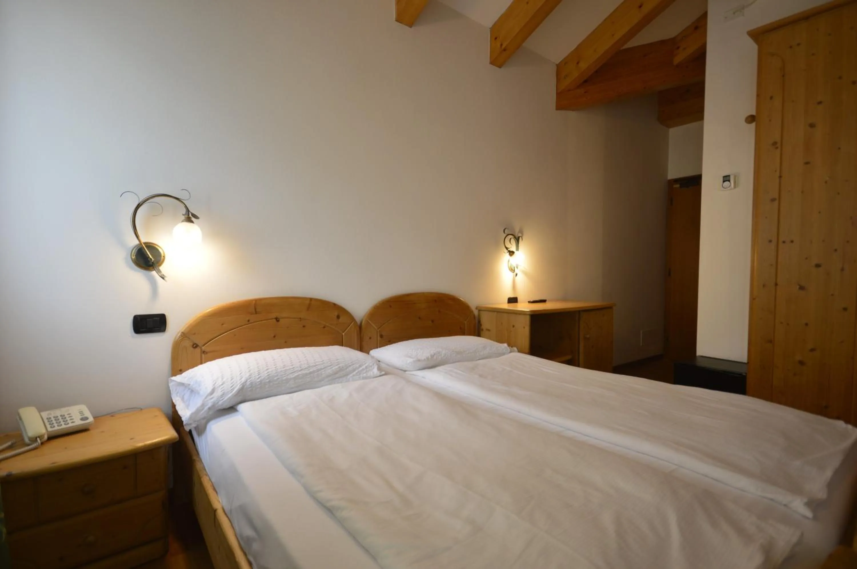 Photo of the whole room, Bed in Hotel Villa Fosine Spa & Wellness