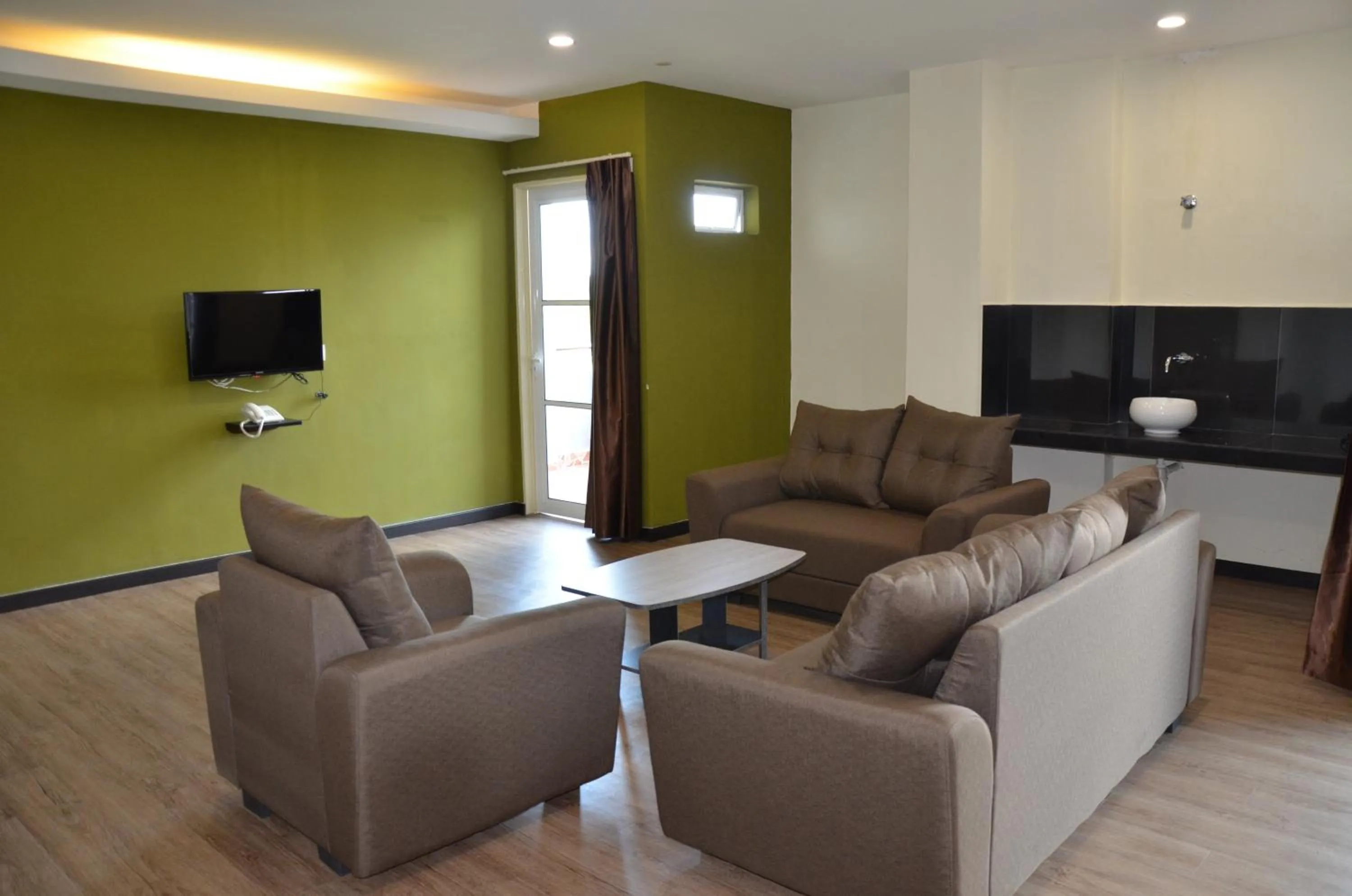 Living room in Riverview Hotel