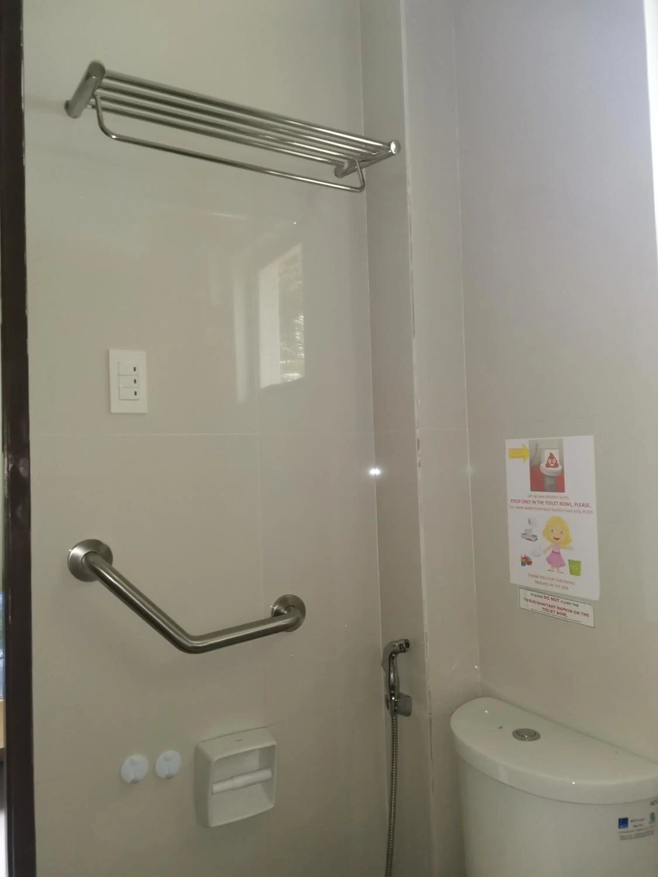 Toilet in Layang Layang Home