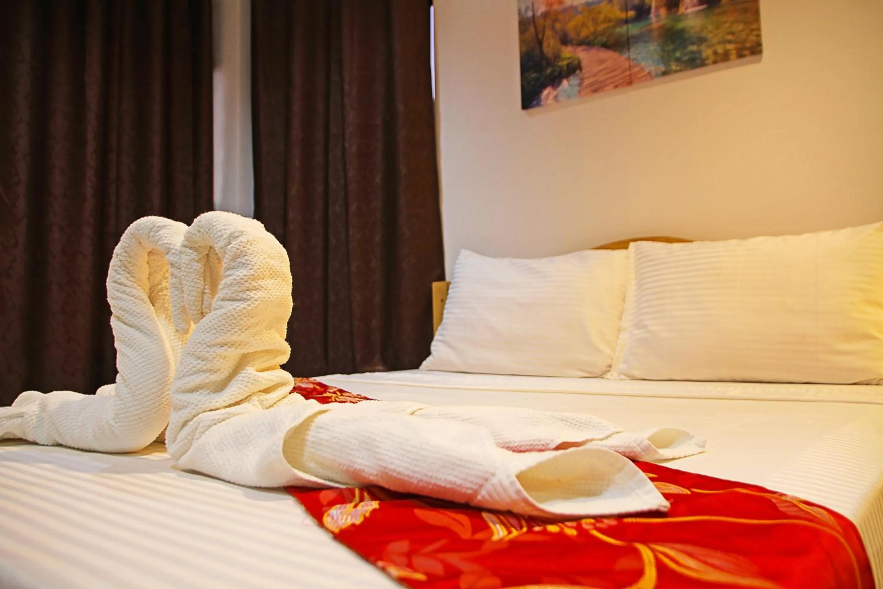 Bed in Layang Layang Home