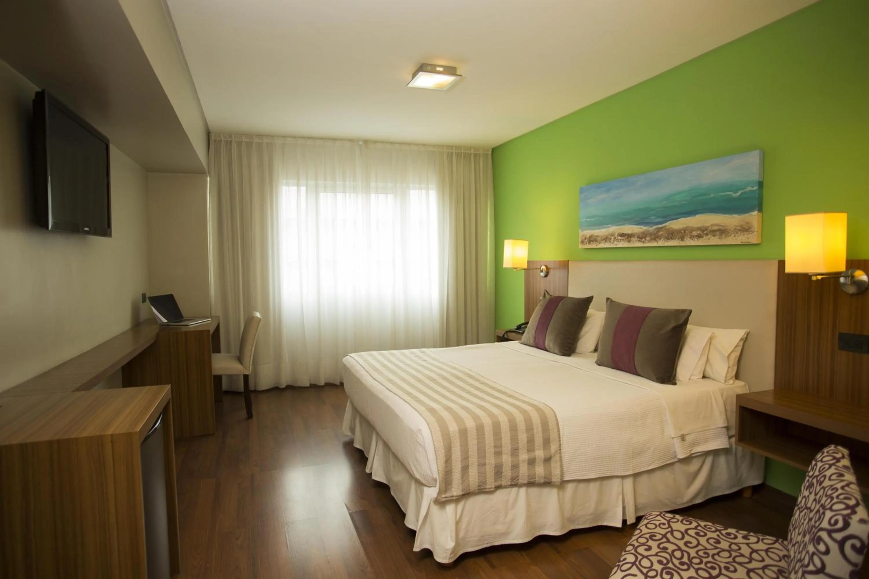 Photo of the whole room, Bed in Hotel Bicentenario Suites & Spa