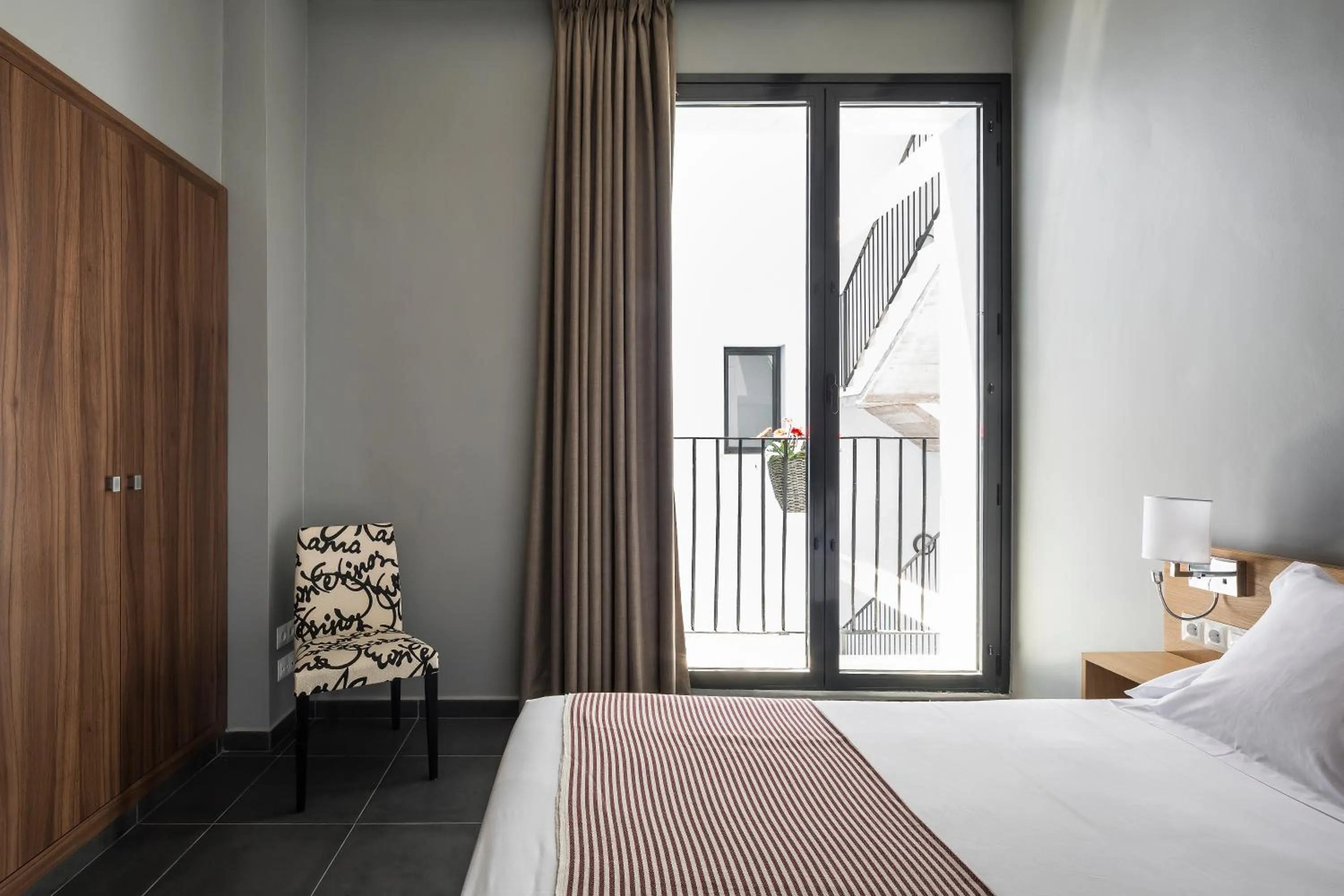 Photo of the whole room, Bed in Catalina Suites San Nicolas