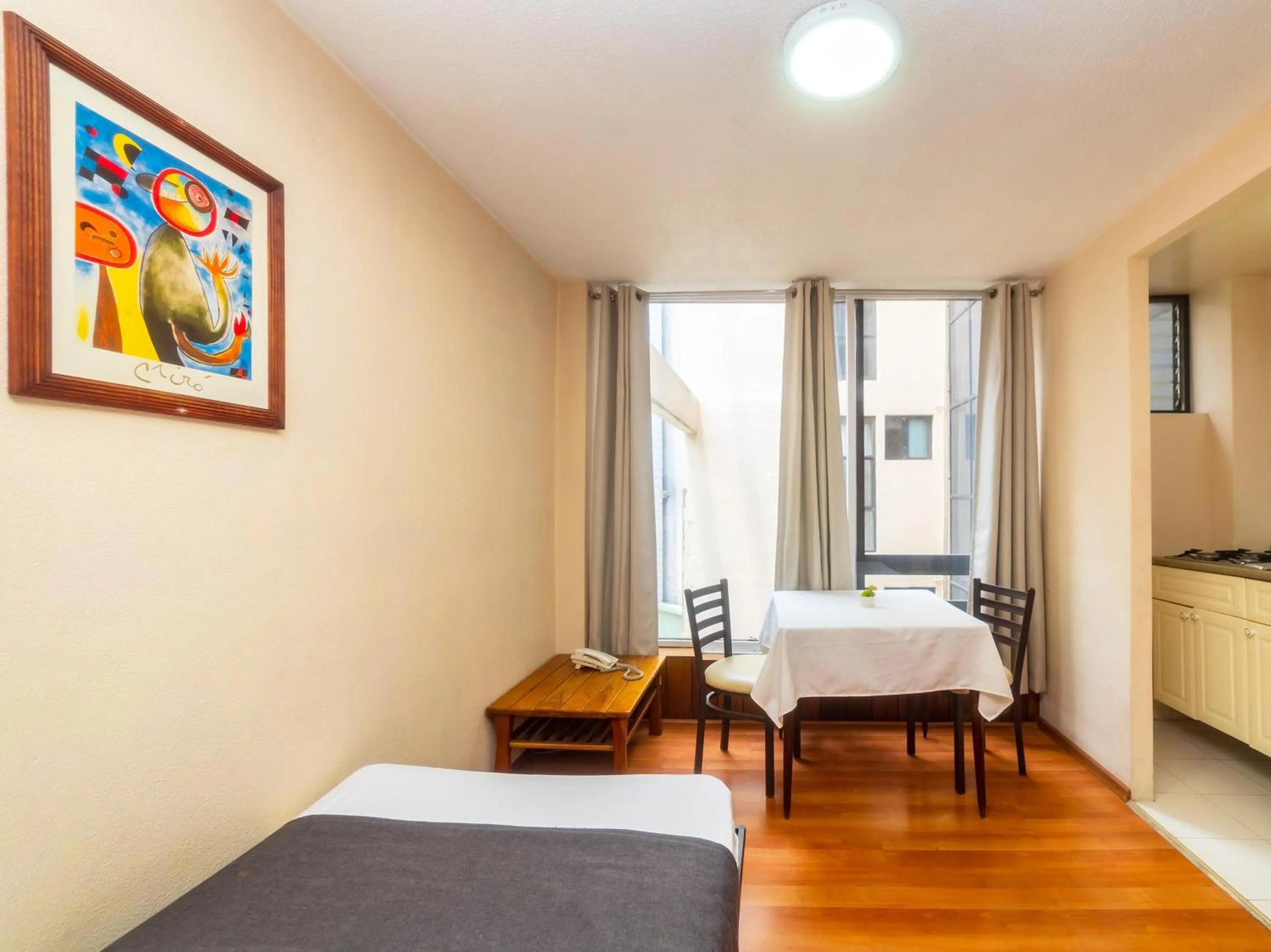 Bedroom, Bed in Capital O Hotel Suites Marne, Mexico City