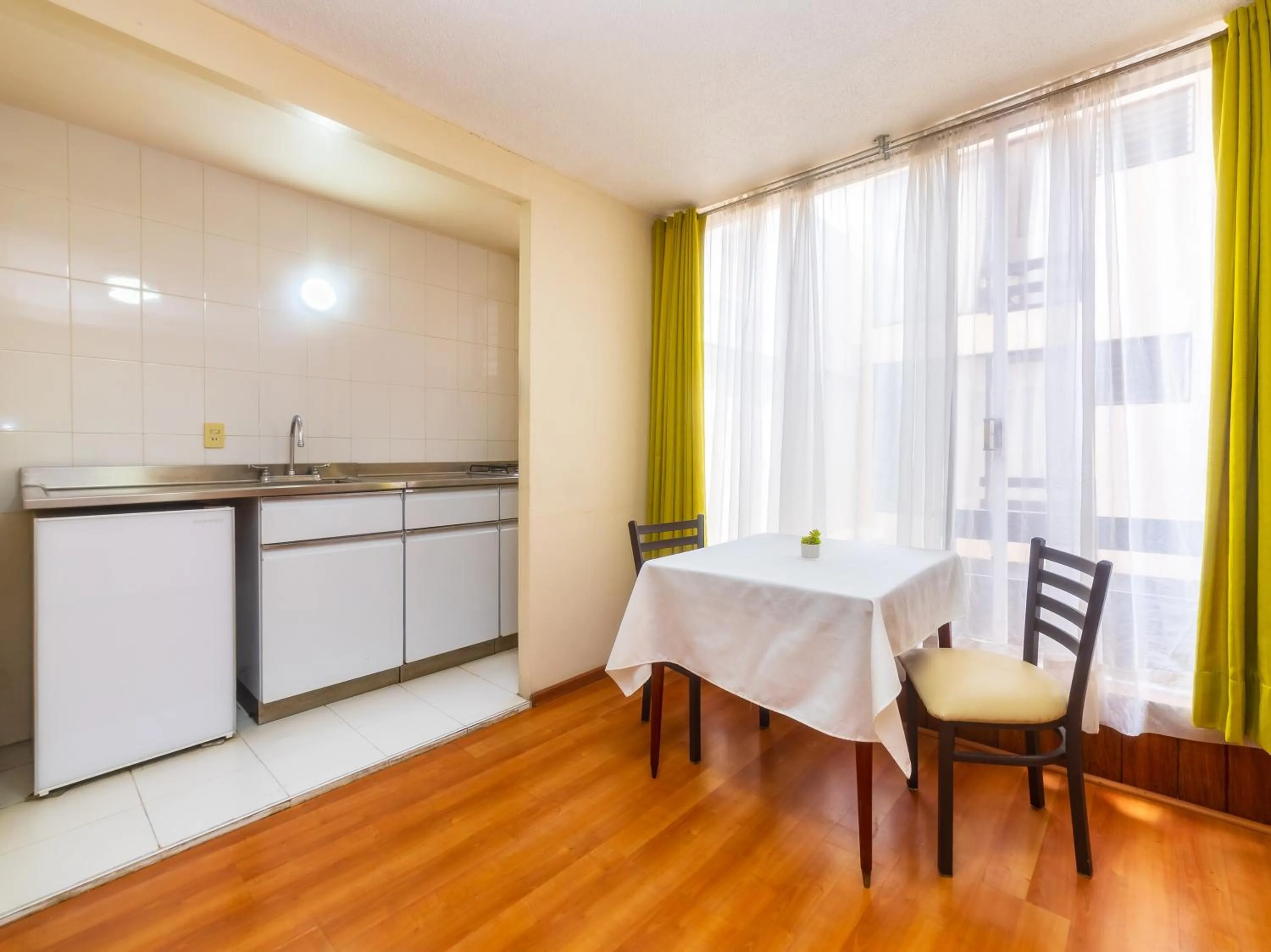 Bedroom in Capital O Hotel Suites Marne, Mexico City