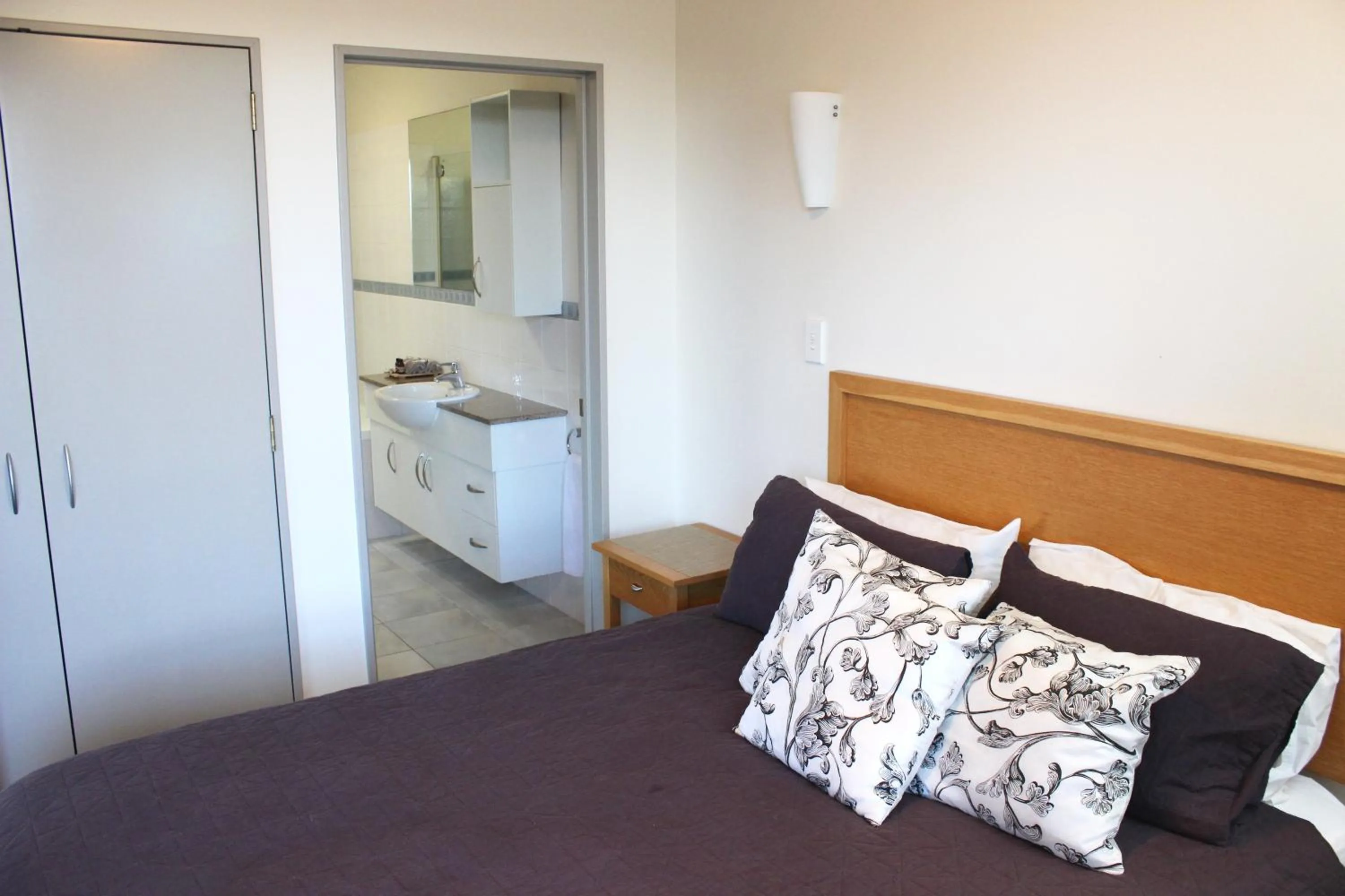 Bed in The Anchorage Apartments