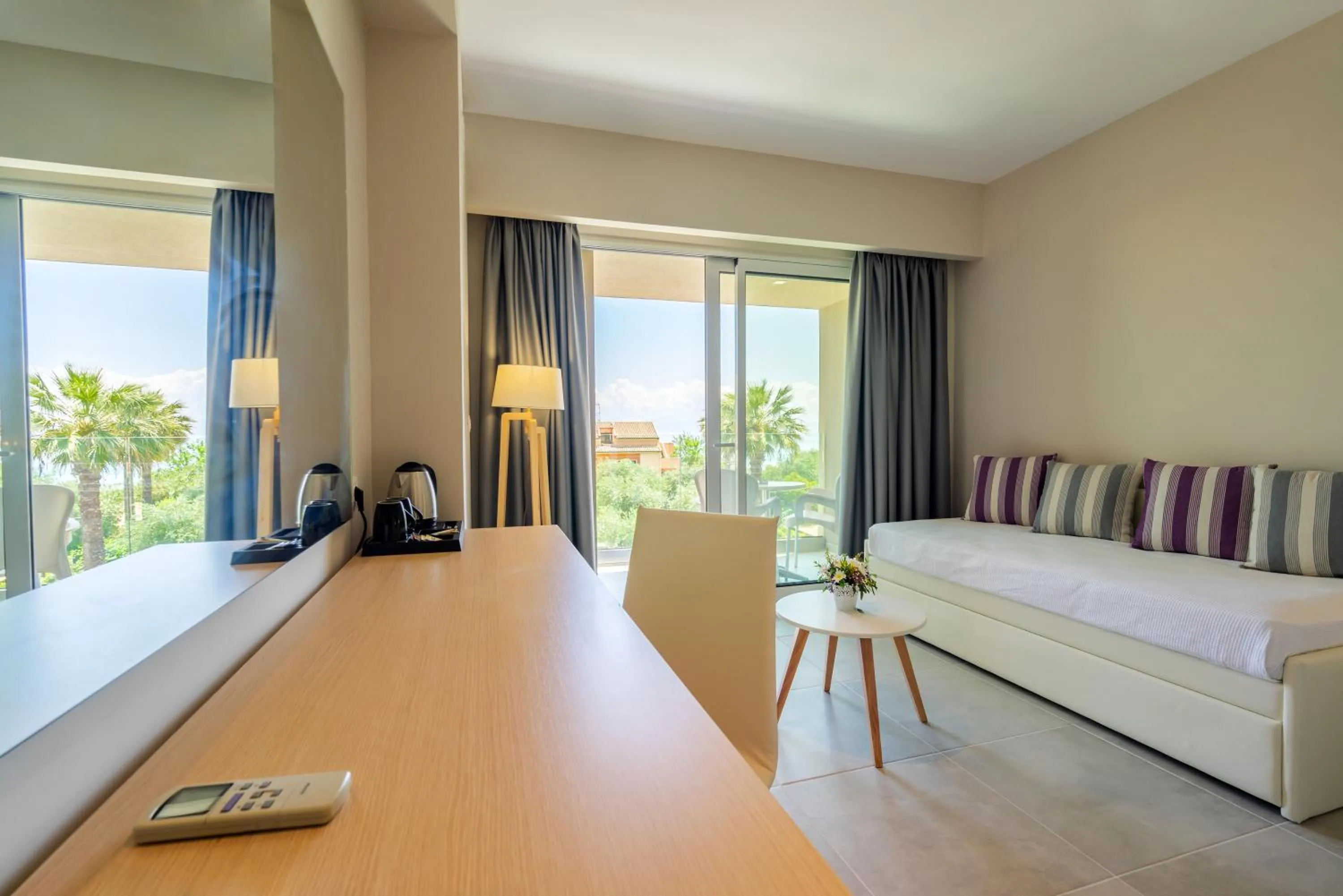 Seating area, Bed in CNic Gemini Hotel