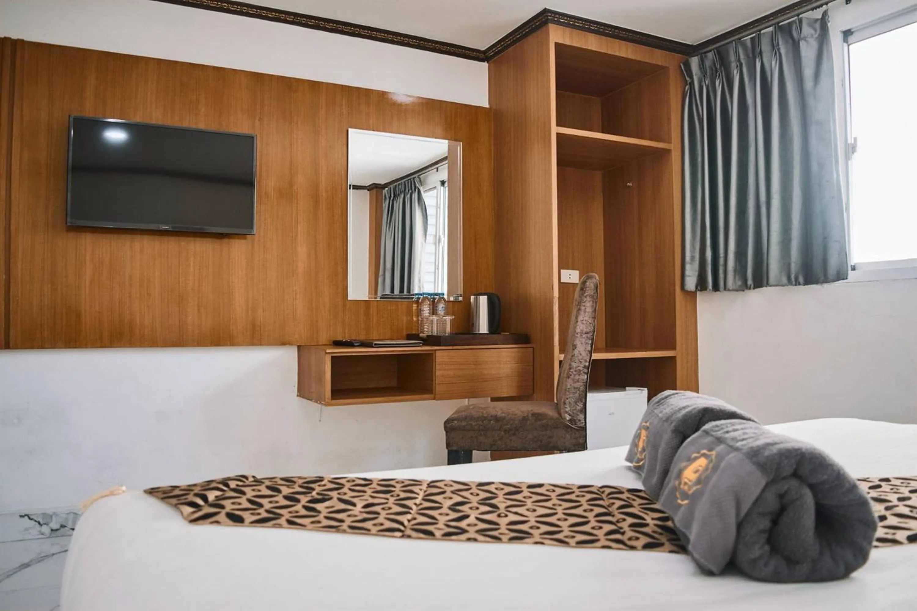 Bed in Papa Ji Hotel and Restaurant