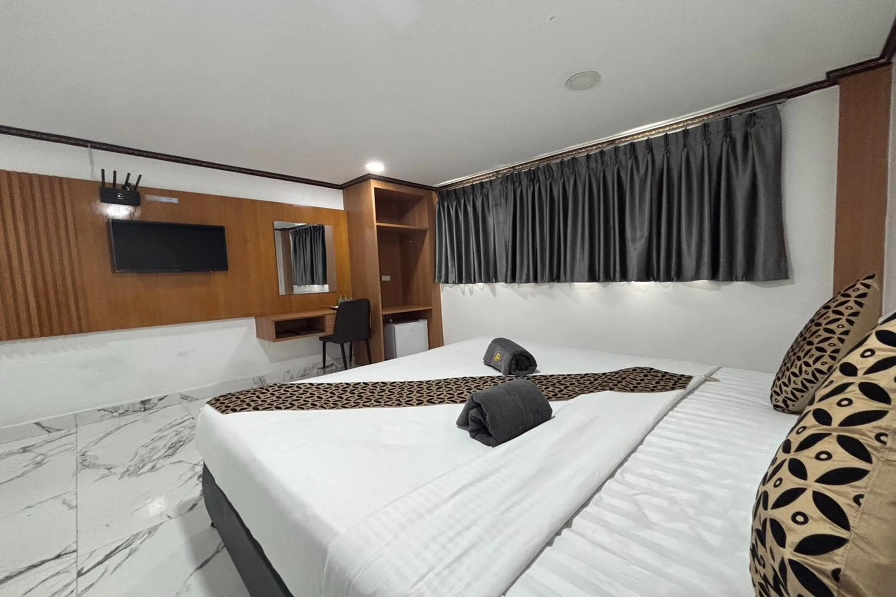 Bed in Papa Ji Hotel and Restaurant