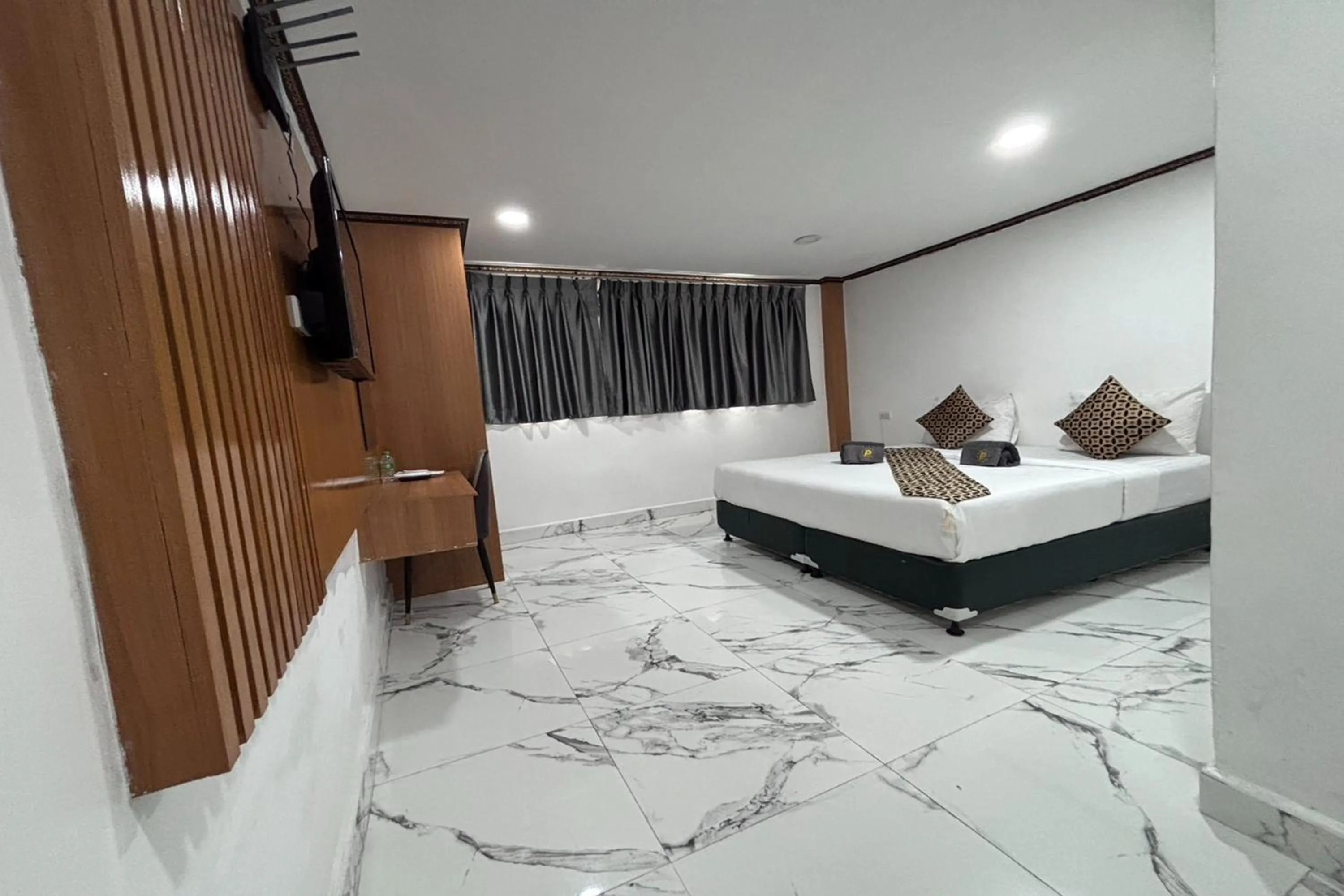 Bed in Papa Ji Hotel and Restaurant