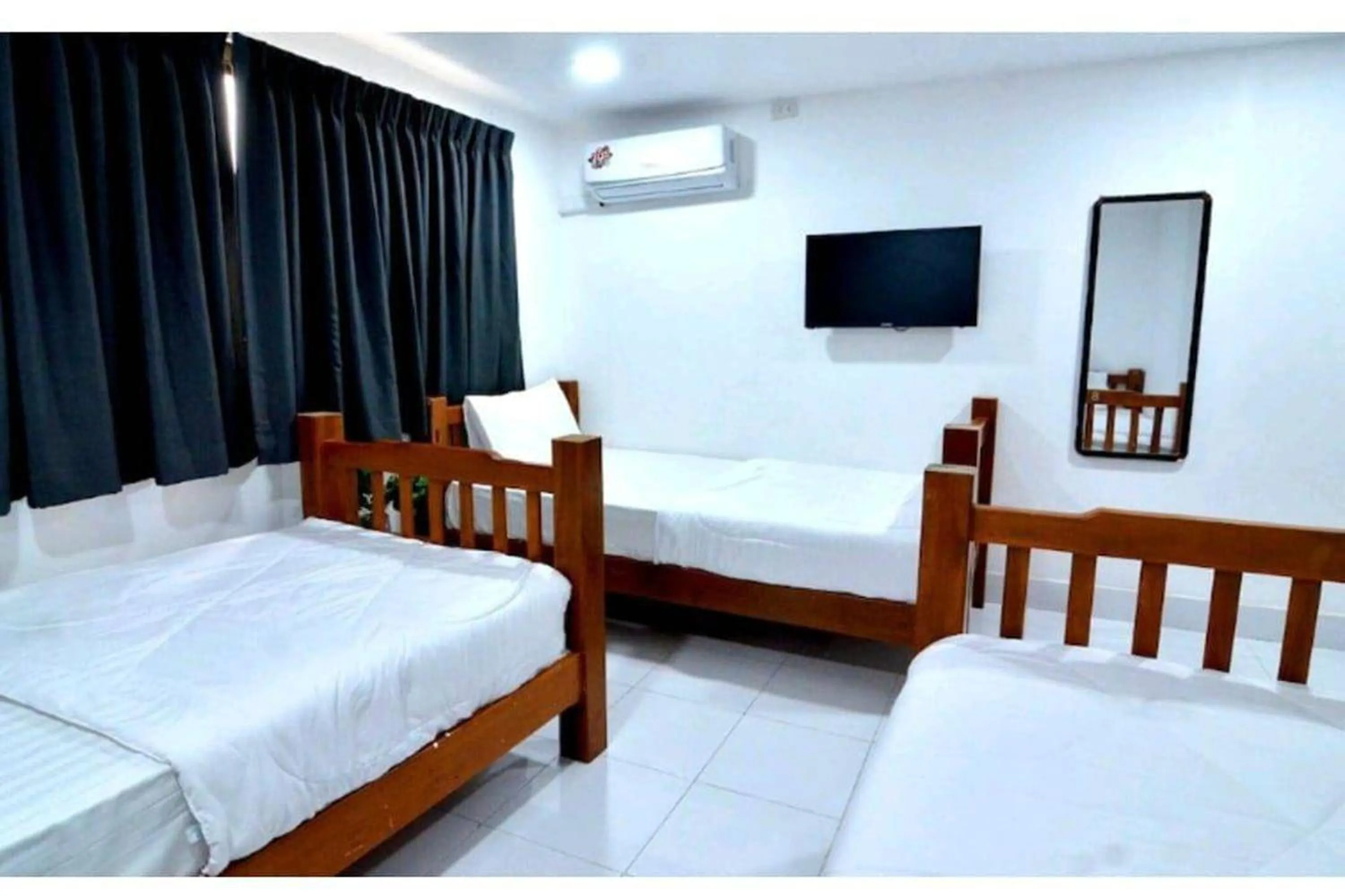 Bed in Papa Ji Hotel and Restaurant