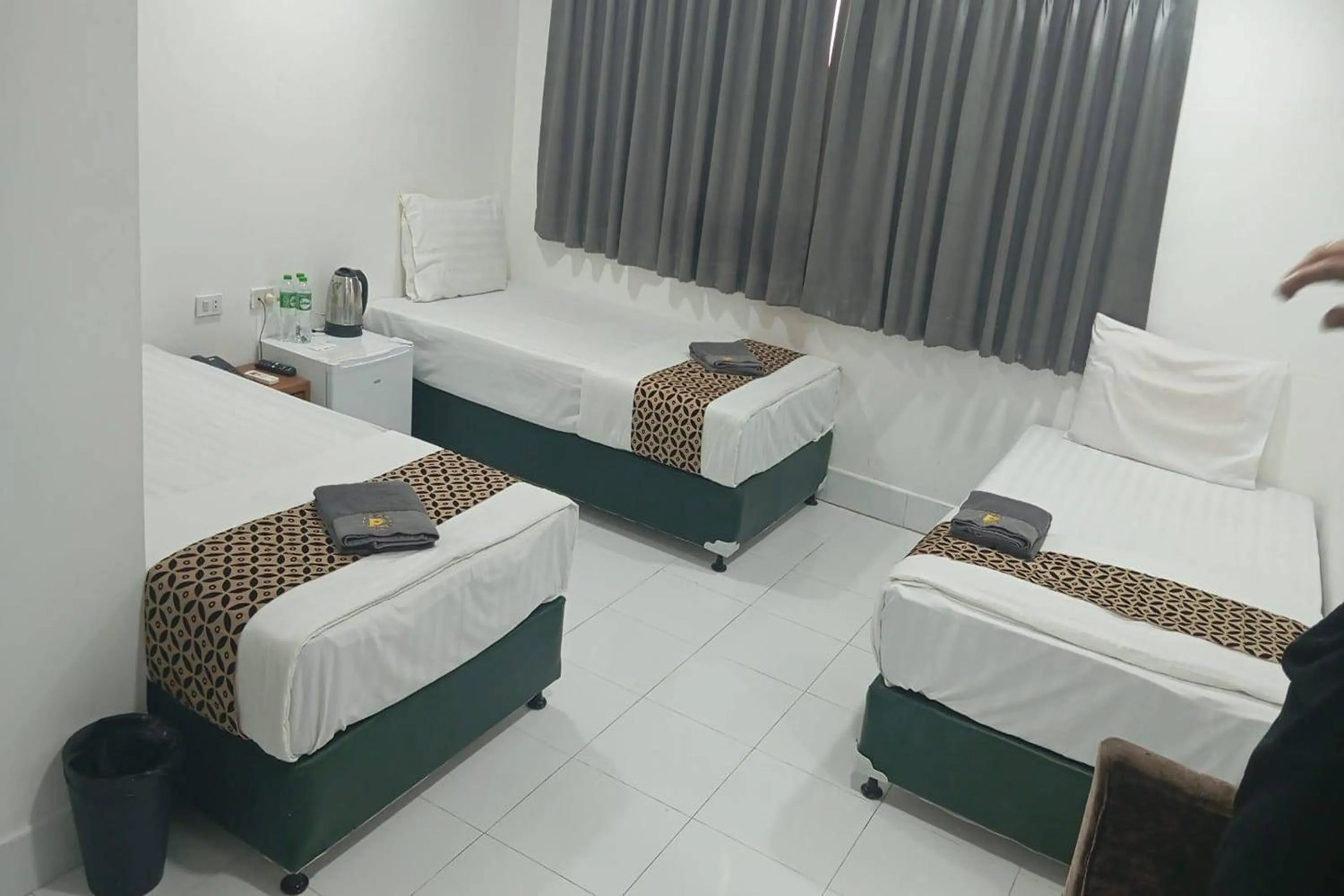 Bed in Papa Ji Hotel and Restaurant