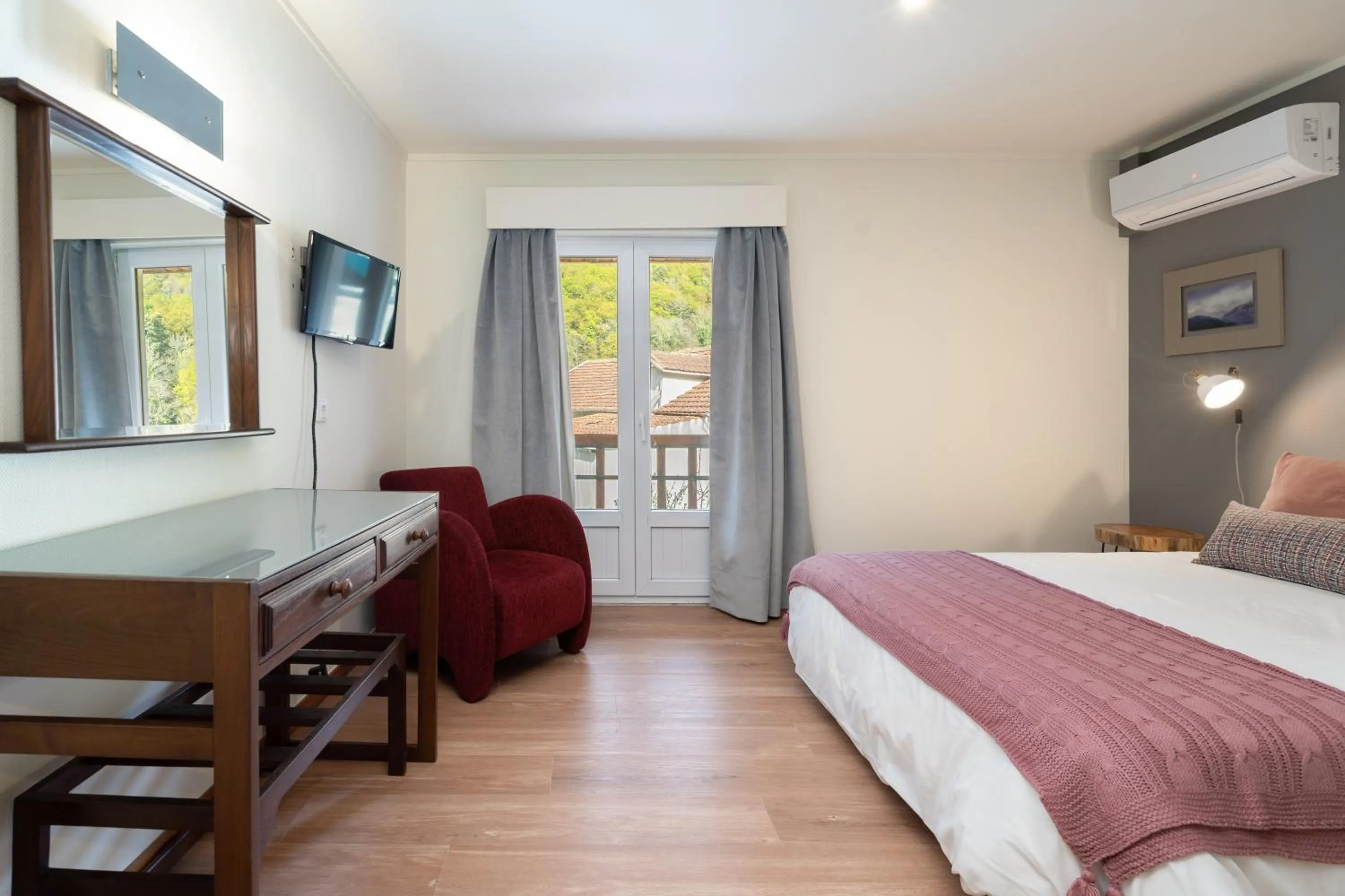 Bed in Hotel Carvalho Araujo