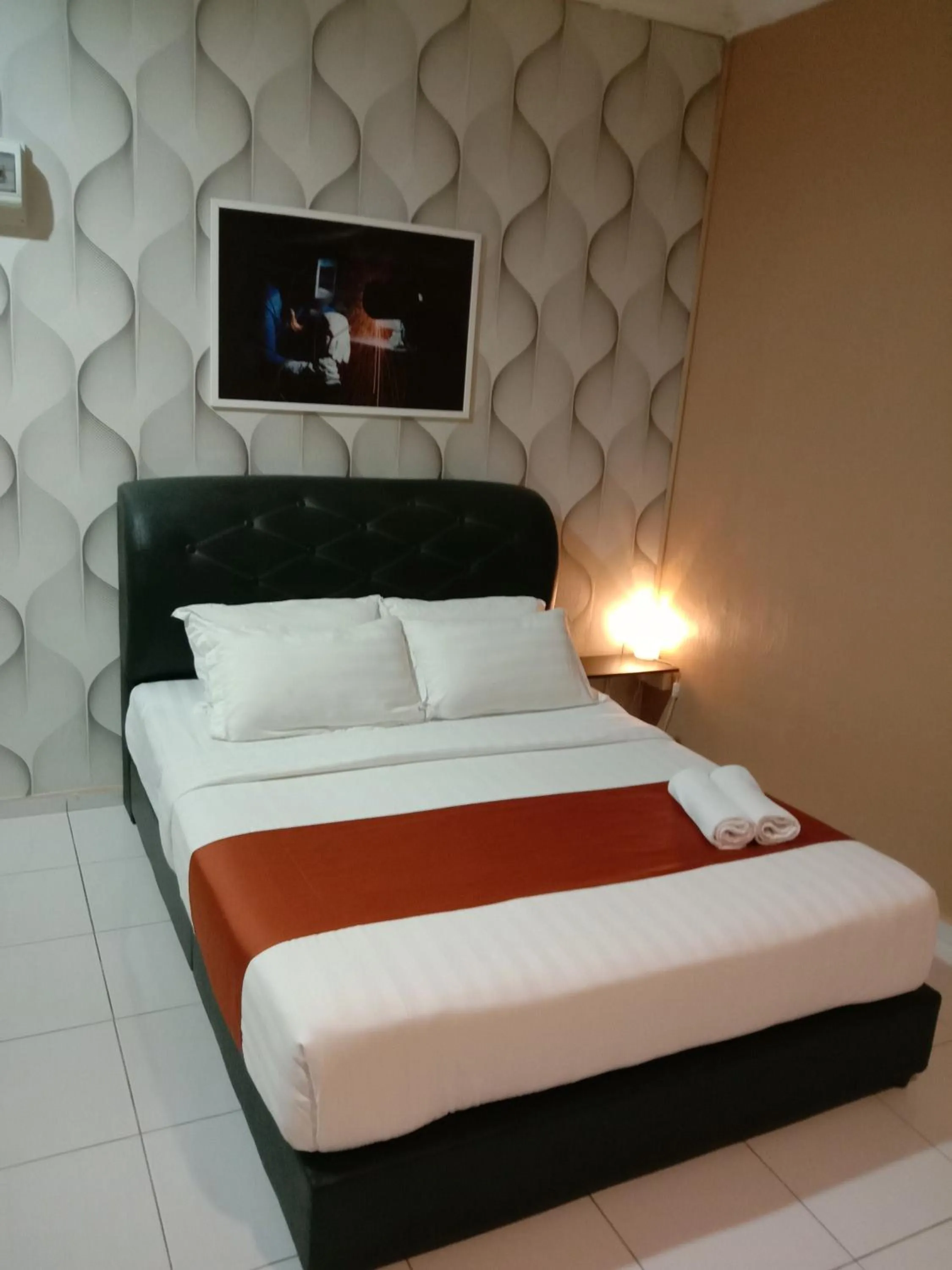 Bed in NDE Hotel