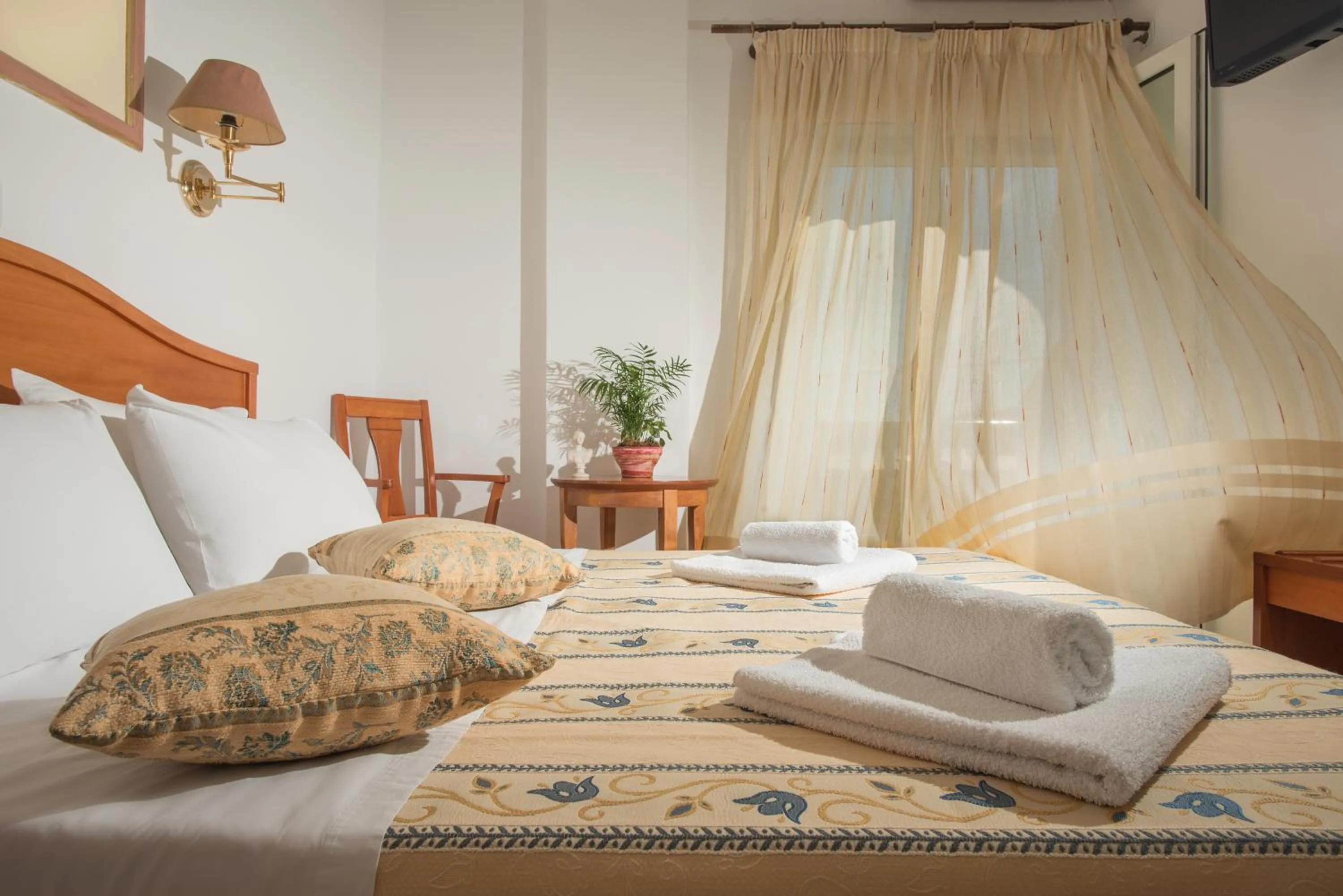 Bed in Hotel Meltemi