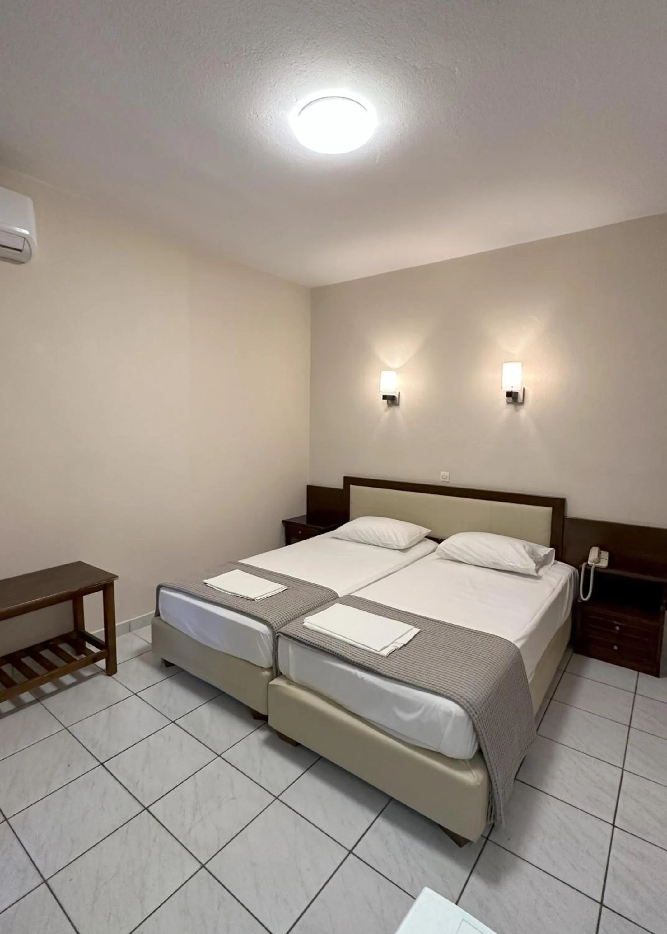 Bed in Hotel Afrodite