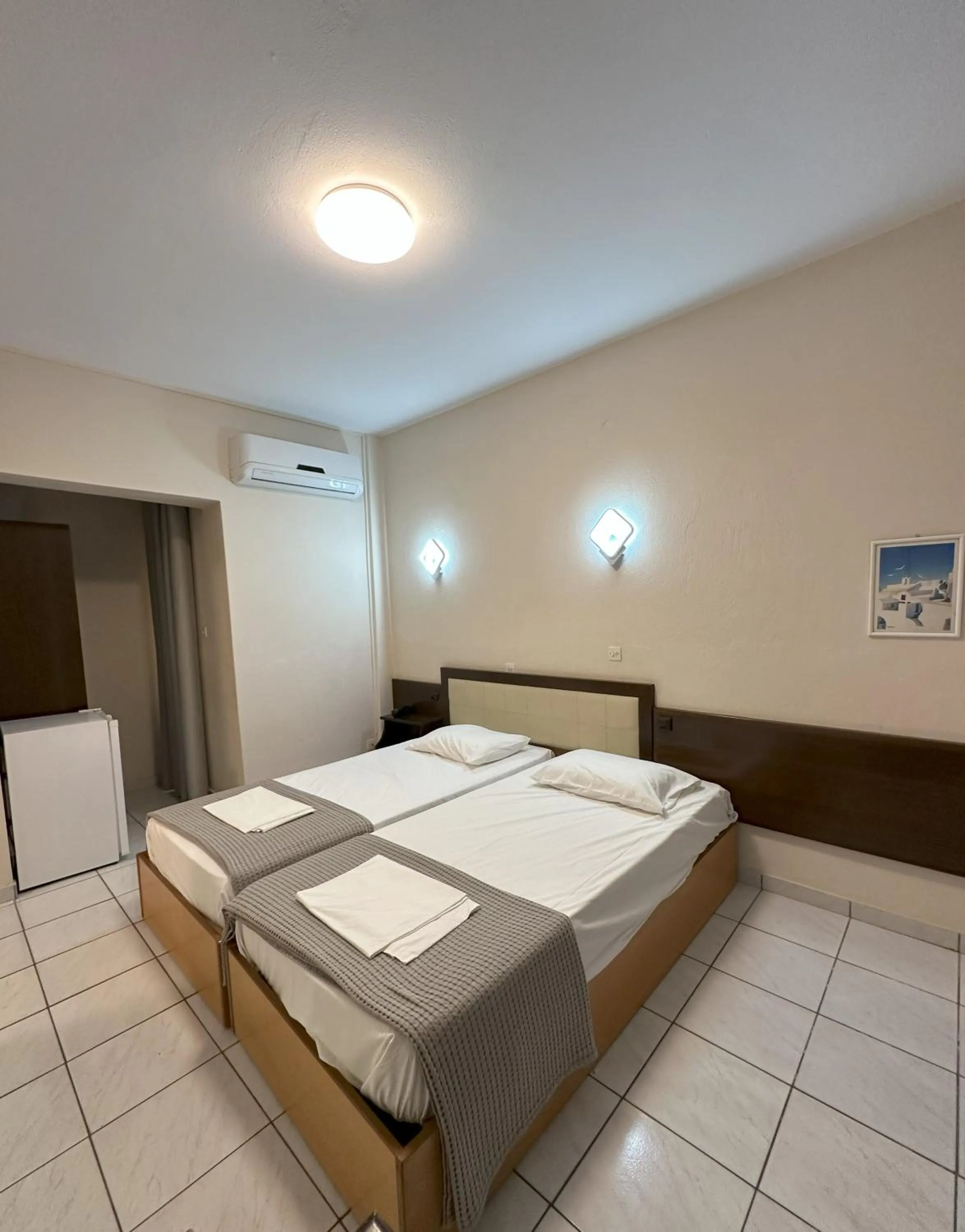 Bed in Hotel Afrodite